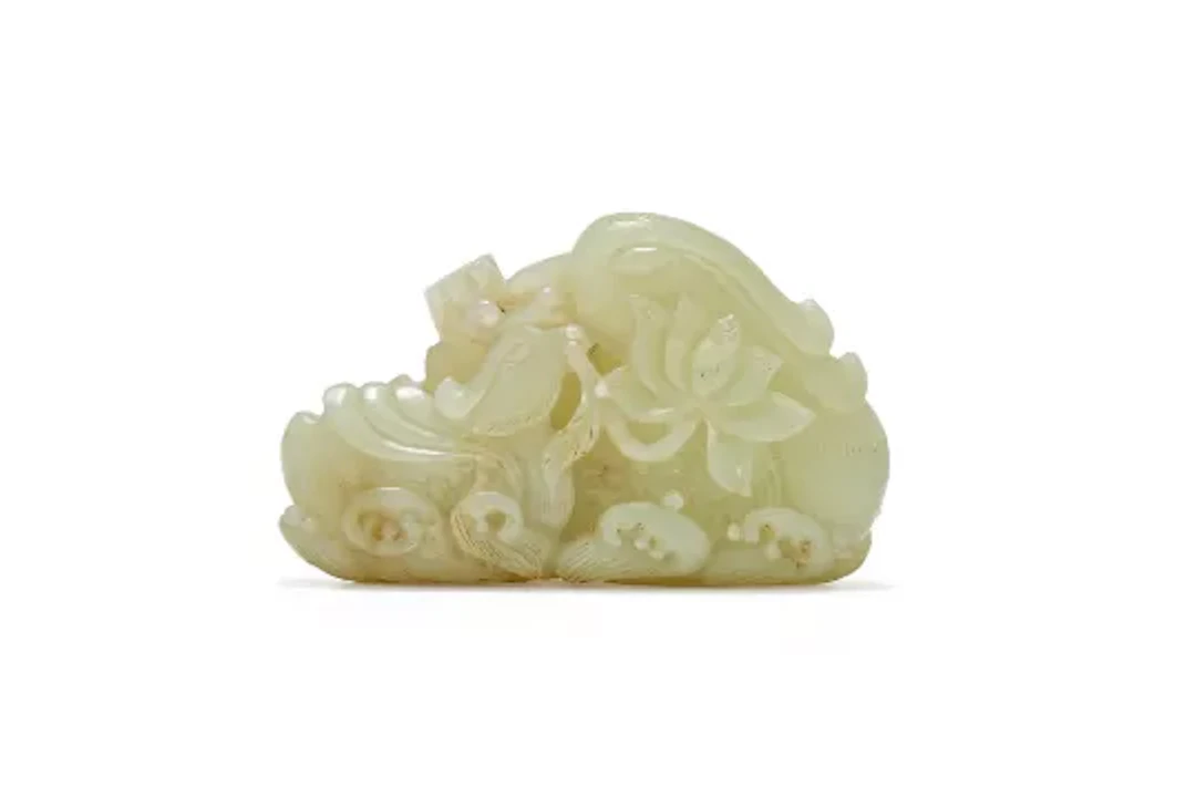 A Chinese celadon carving of Mandarin duck, Qing dynasty, 18th or 19th century