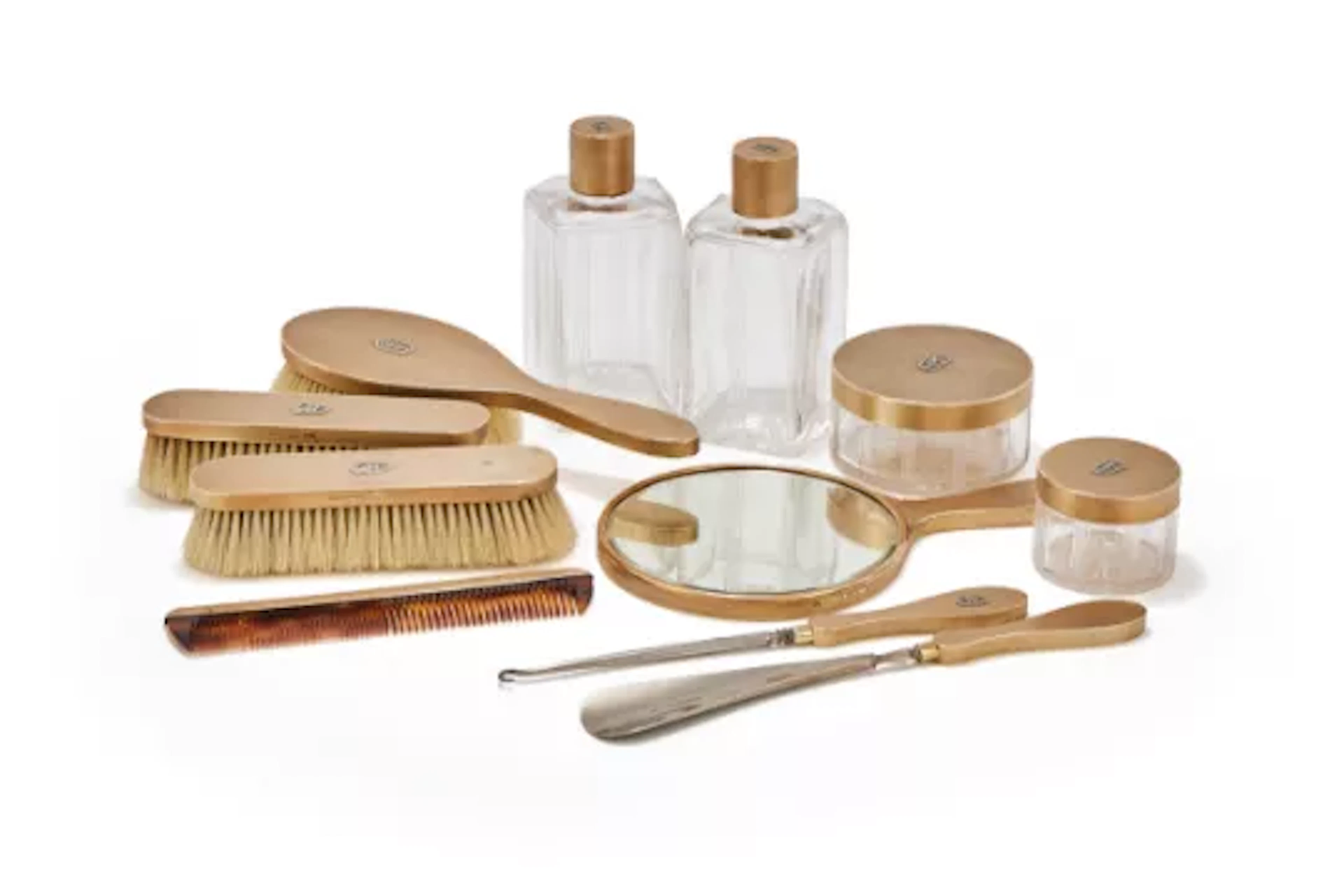 Y ASPREY & CO. LTD., A 9 CARAT GOLD MOUNTED ELEVEN PIECE DRESSING