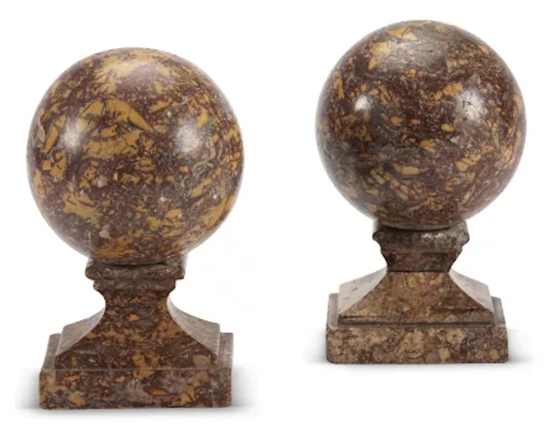A PAIR OF BROCATELLO MARBLE BALL FINIALS, SPANISH, 18TH CENTURY