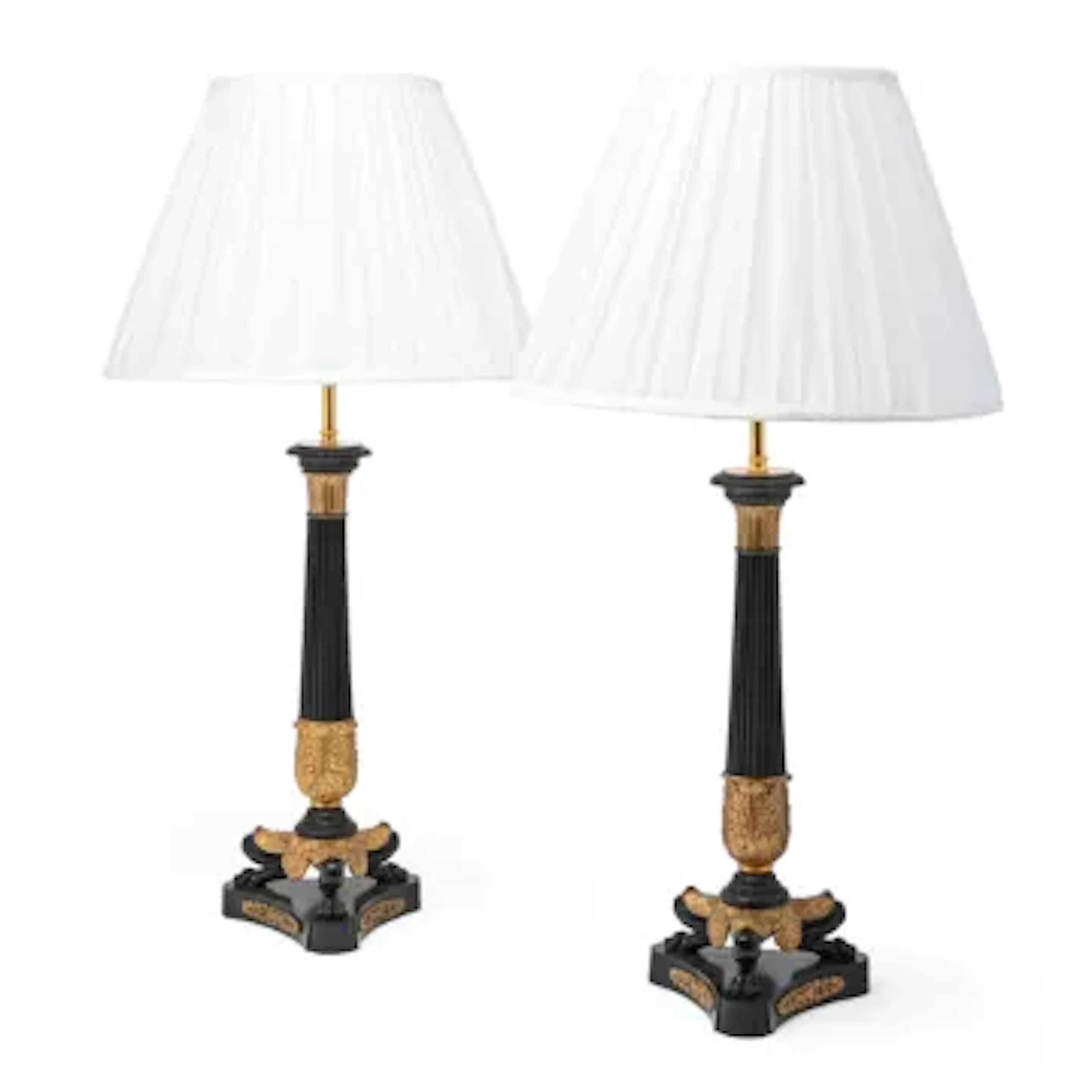 A PAIR OF GILT AND PATINATED BRONZE CANDLESTICK TABLE LIGHTS, FRENCH