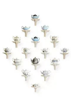 A COLLECTION OF MOSTLY STAFFORDSHIRE PRINTED SMALL TEAPOTS AND COVERS