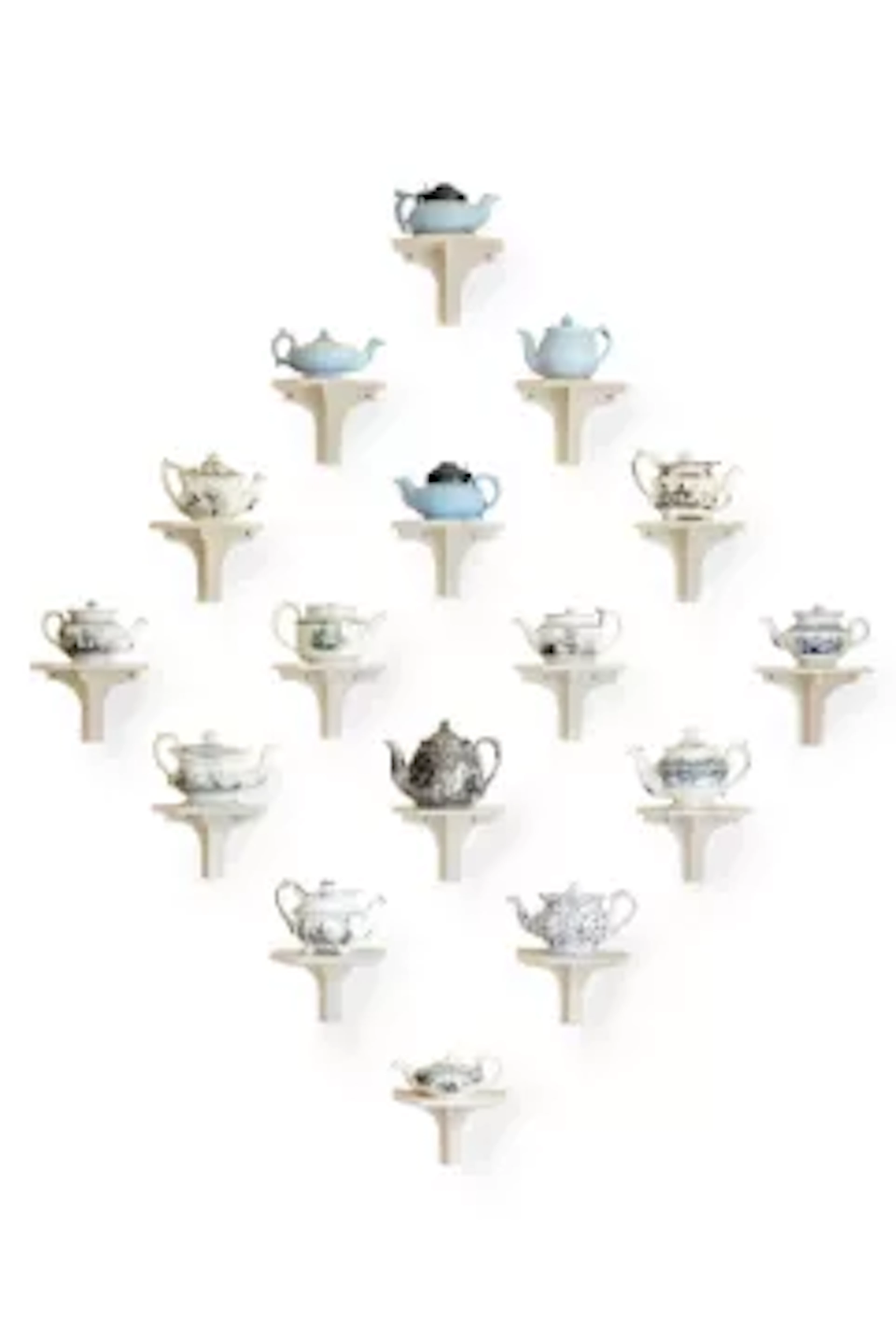 A COLLECTION OF MOSTLY STAFFORDSHIRE PRINTED SMALL TEAPOTS AND COVERS