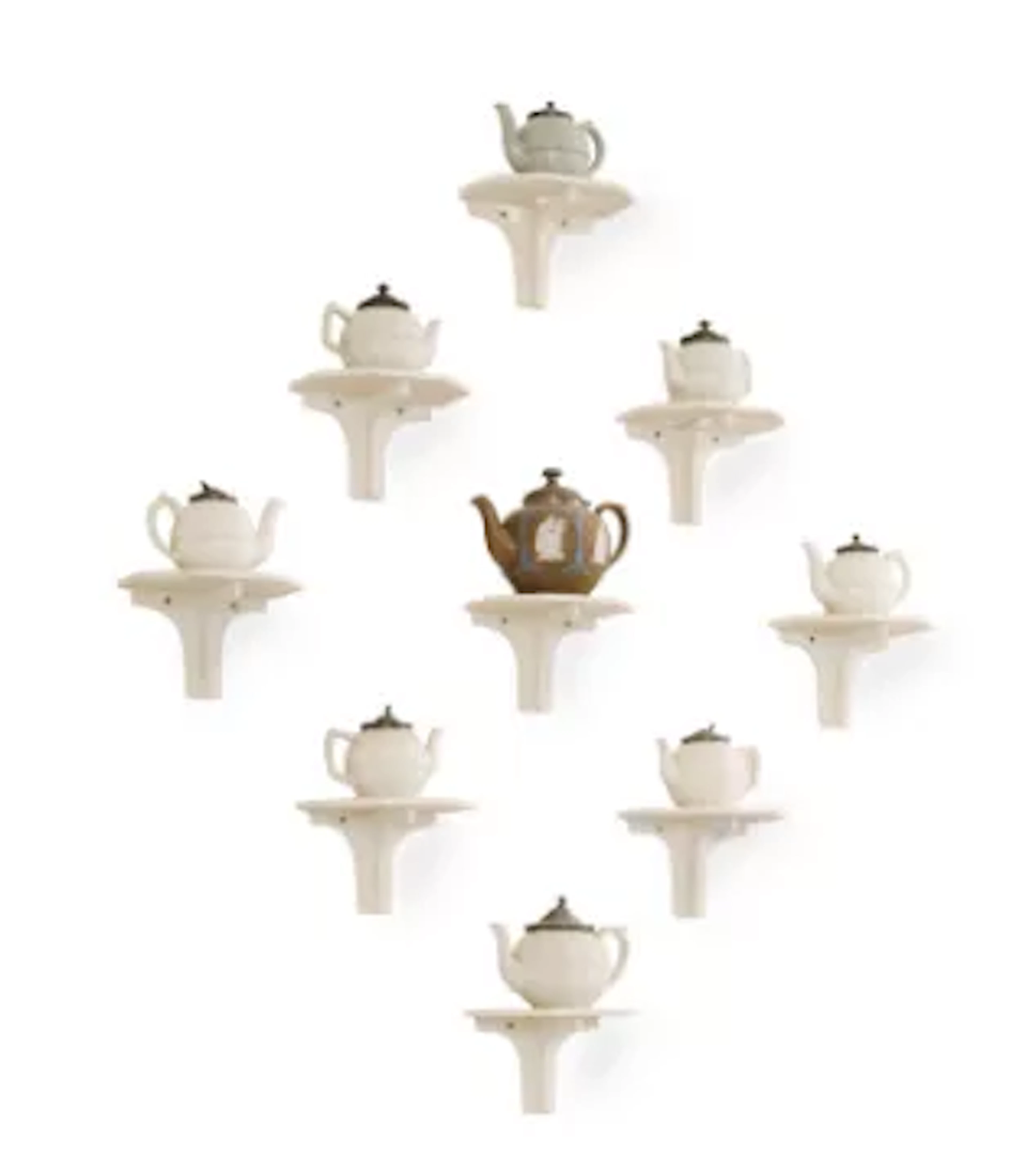 A COLLECTION OF MOSTLY STAFFORDSHIRE DRY-BODIED STONEWARE TEAPOTS
