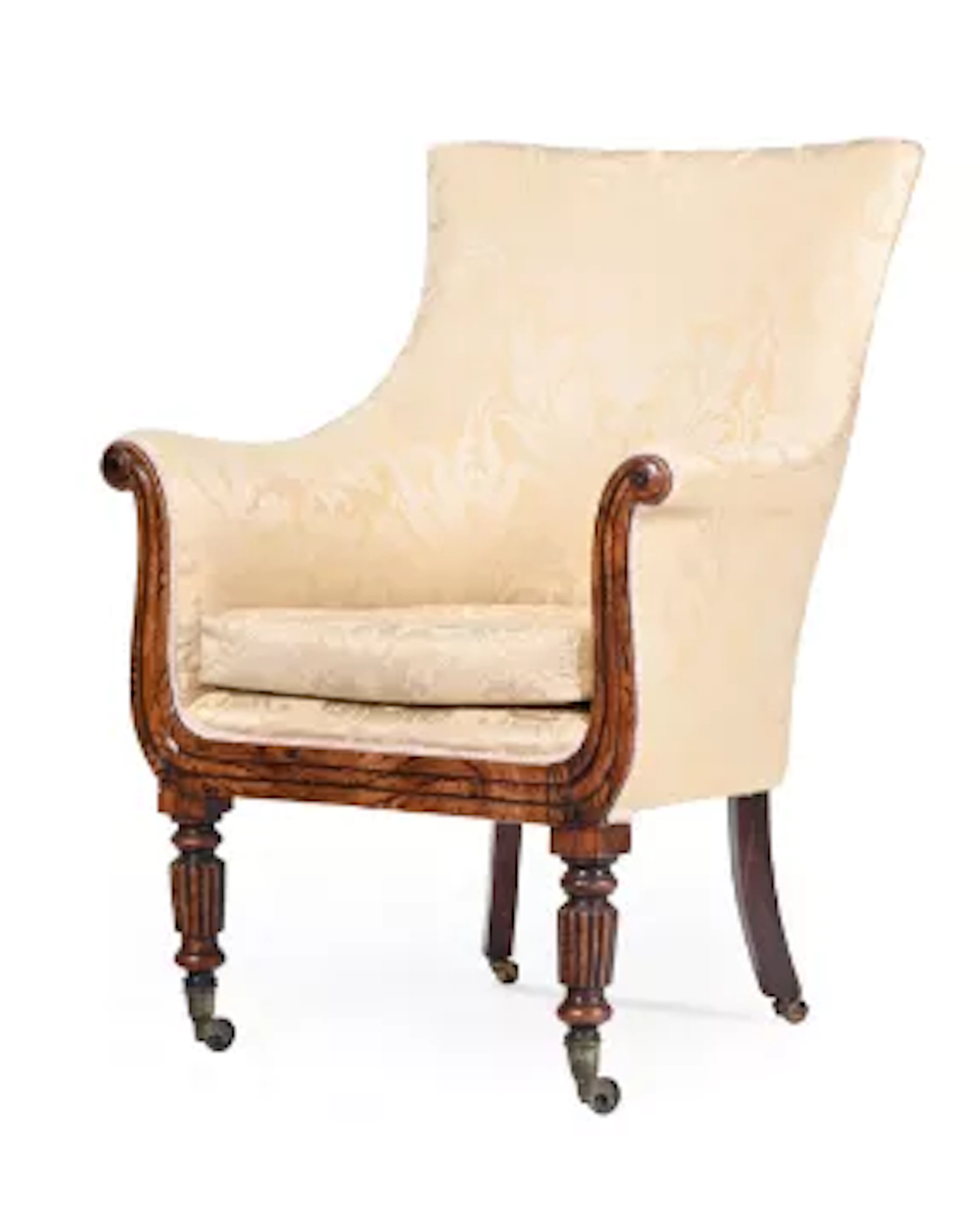 A REGENCY SIMULATED ROSEWOOD LIBRARY ARMCHAIR, ATTRIBUTED TO GILLOWS
