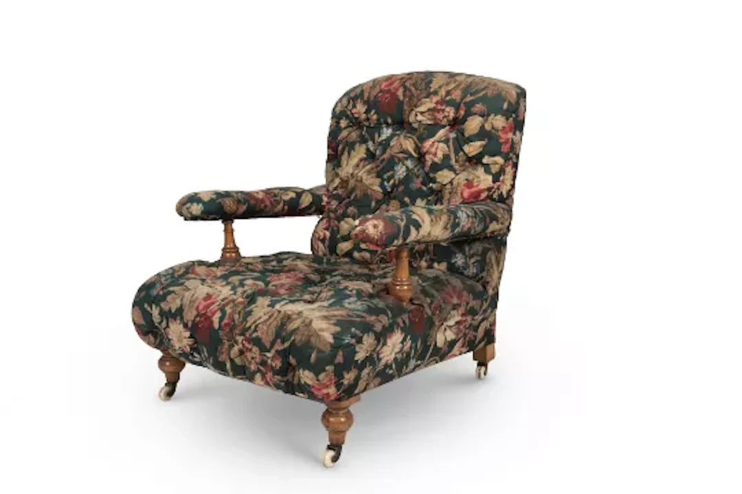 A VICTORIAN SATINBIRCH EASY ARMCHAIR, IN THE MANNER OF HOWARD AND