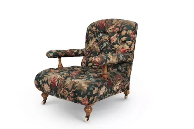 A VICTORIAN SATINBIRCH EASY ARMCHAIR, IN THE MANNER OF HOWARD AND