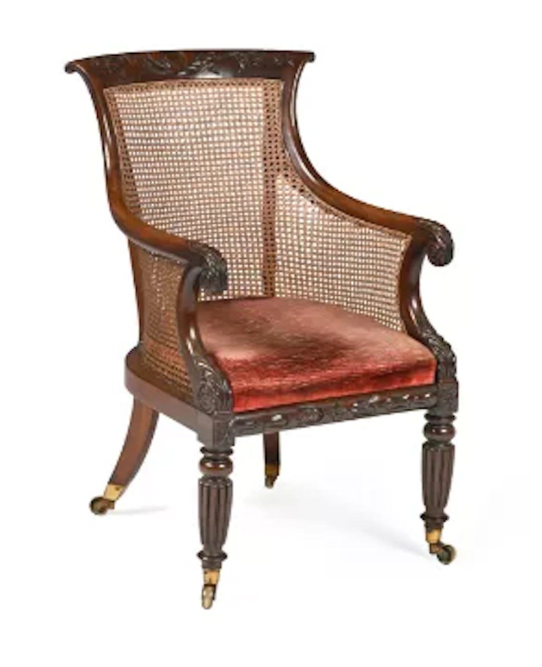 A REGENCY MAHOGANY LIBRARY BERGERE ARMCHAIR, ATTRIBUTED TO GILLOWS, CIRCA 1815