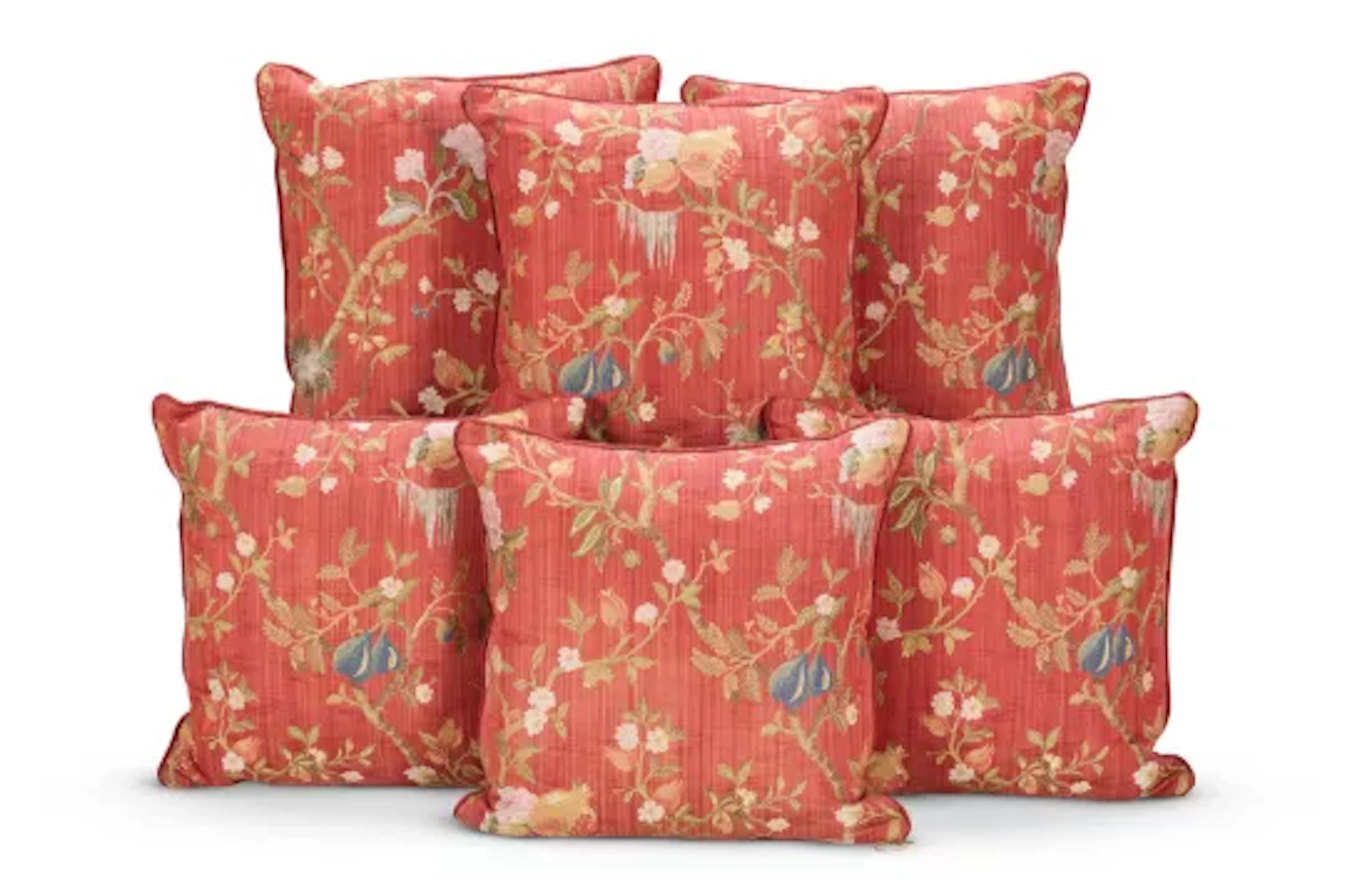 A SET OF SIX CUSHIONS COVERED IN THE 'MELOGRANO' DESIGN FLORAL LAMPAS