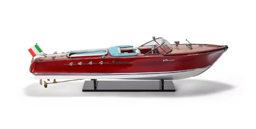 A DESK MODEL OF A RIVA SPEEDBOAT