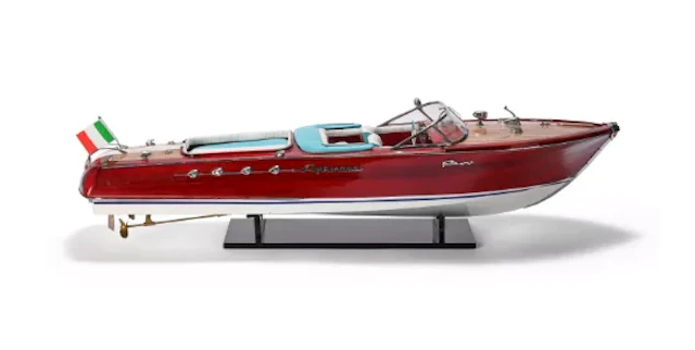 A DESK MODEL OF A RIVA SPEEDBOAT