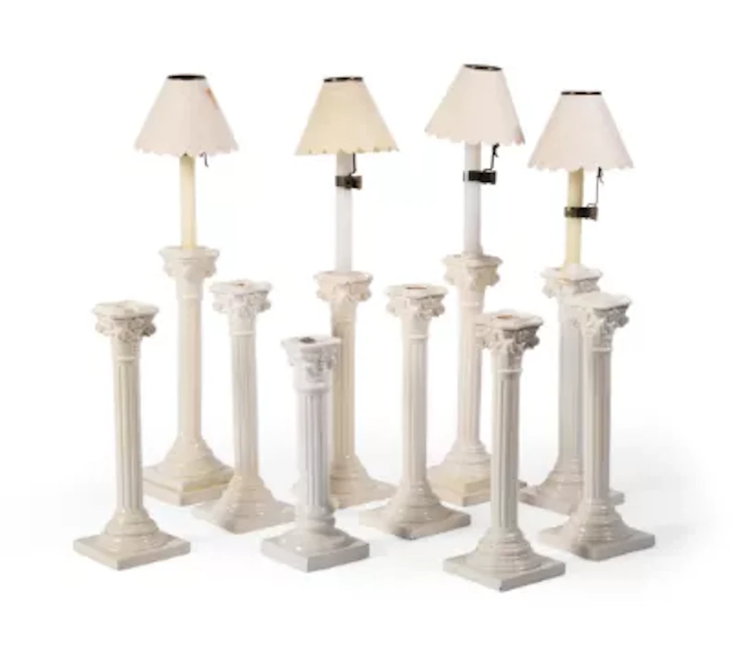 TEN VARIOUS CREAM COLOURED POTTERY COLUMNAR CANDLESTICKS, LATE 19TH