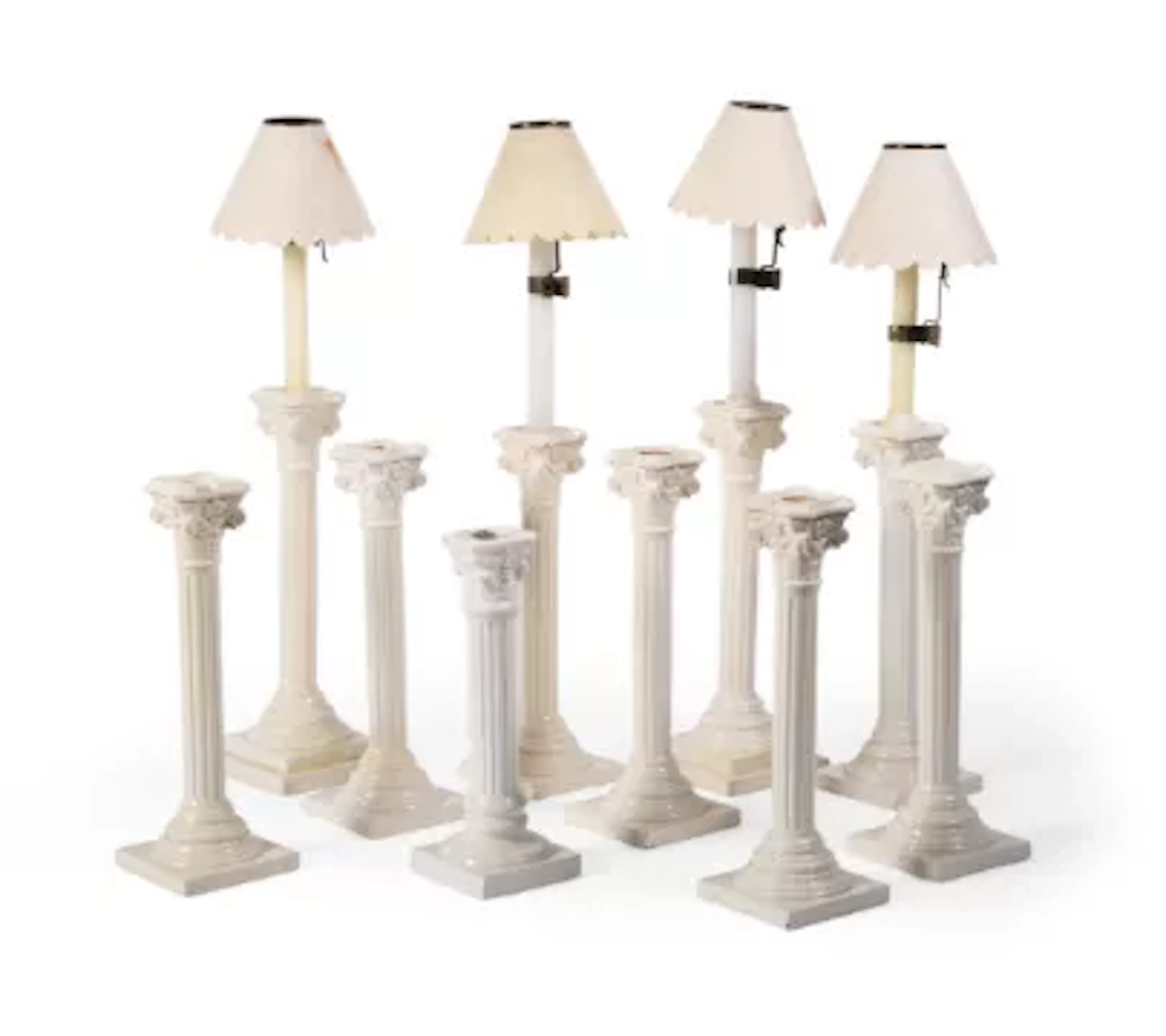 TEN VARIOUS CREAM COLOURED POTTERY COLUMNAR CANDLESTICKS, LATE 19TH