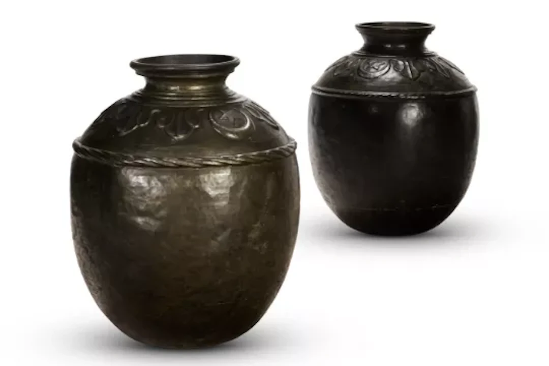 A LARGE NEAR PAIR OF PATINATED COPPER STORAGE JARS, SINDH PROVINCE