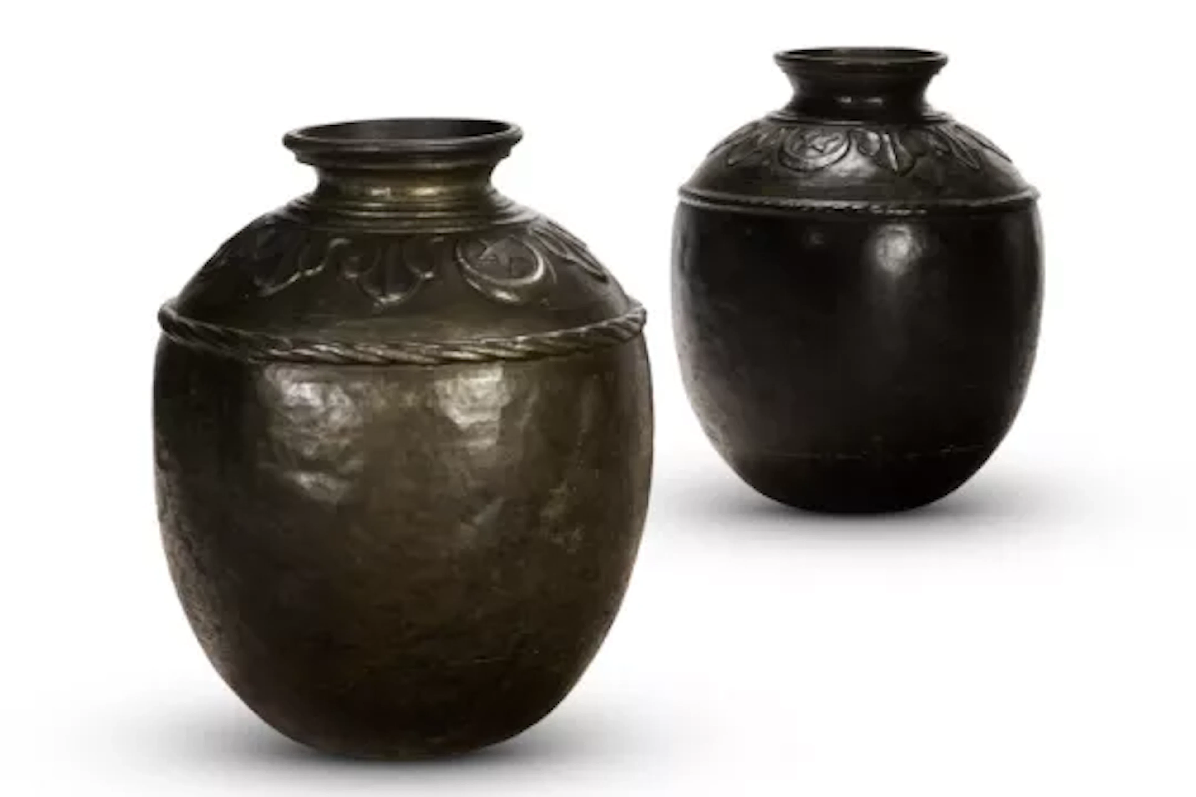 A LARGE NEAR PAIR OF PATINATED COPPER STORAGE JARS, SINDH PROVINCE
