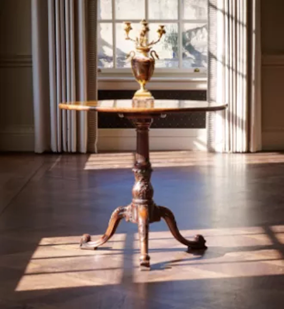 A FINE GEORGE II CARVED MAHOGANY TRIPOD TABLE, CIRCA 1755