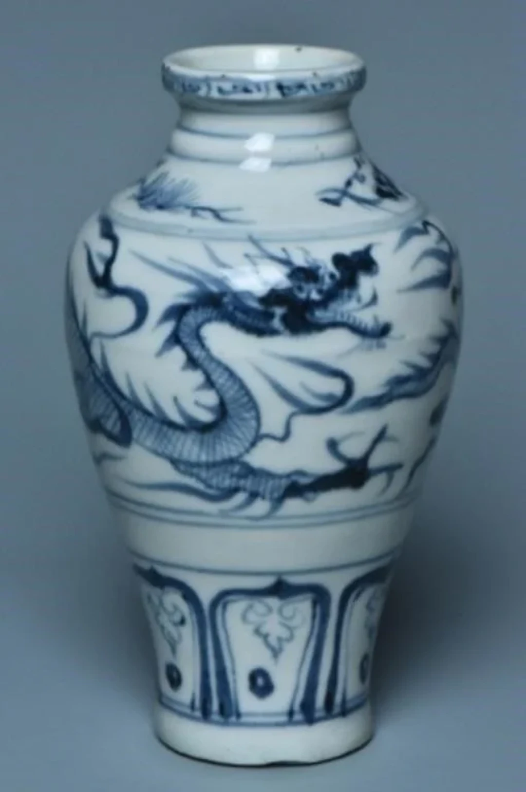 A YUAN DYNASTY BLUE AND WHITE DRAGON VASE