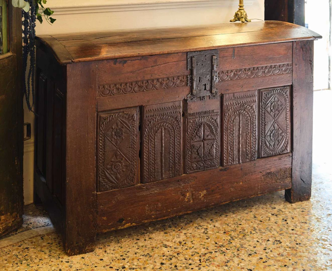 Chest, with oak panels carved in bas-relief