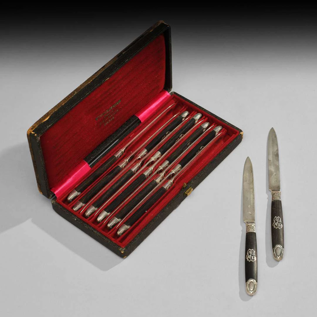 TWELVE DESSERT KNIVES