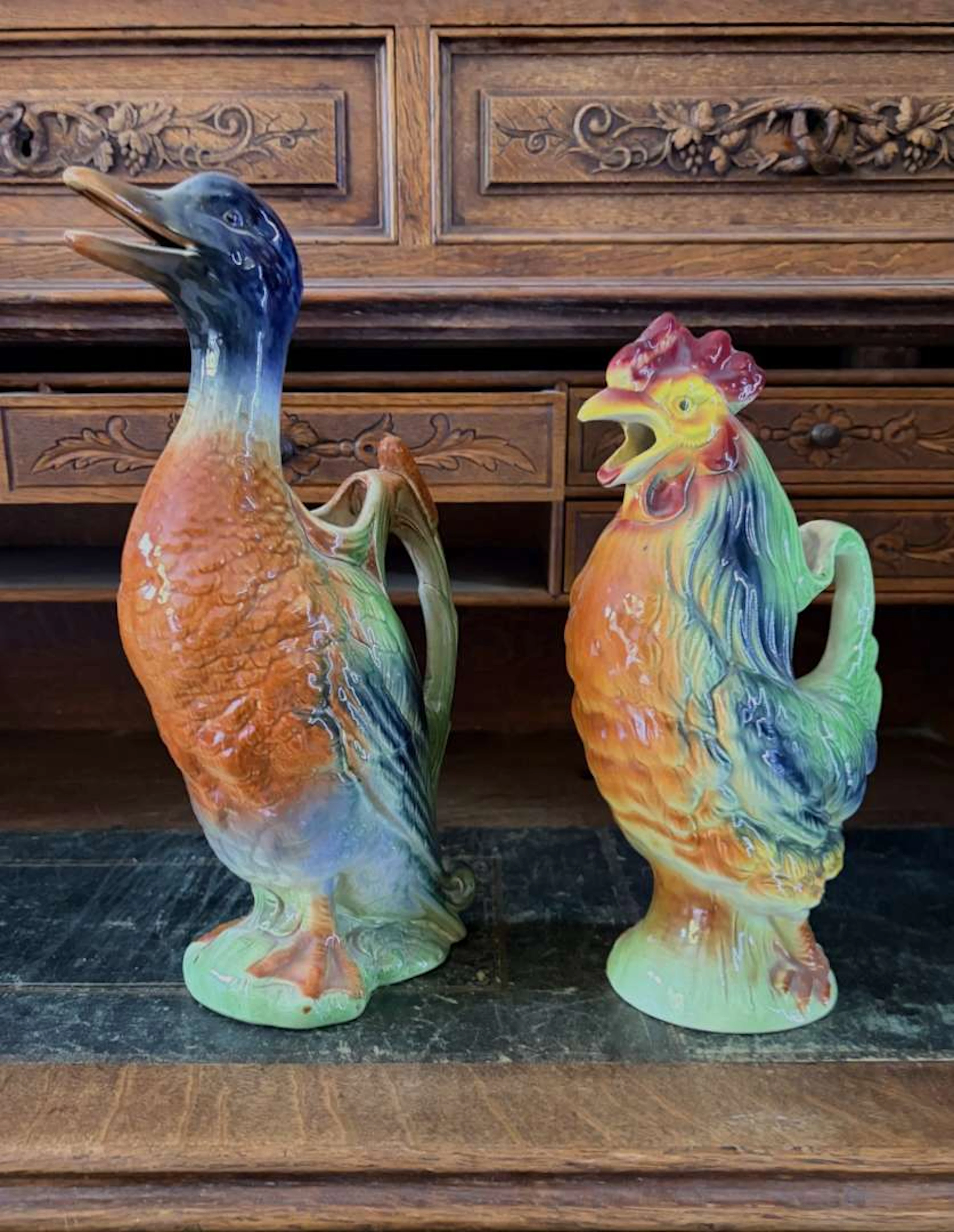 SAINT CLEMENT, Two glazed earthenware jugs