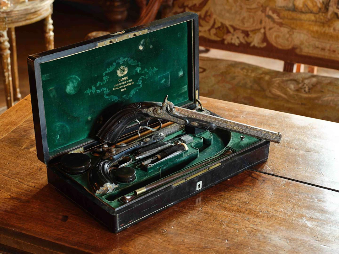 CARON, the King’s arquebusier, A pair of duelling pistols in a case