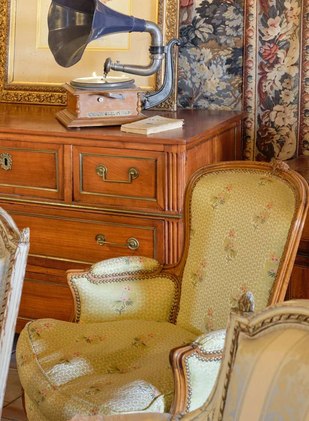 A pair of armchairs, carved and moulded wood