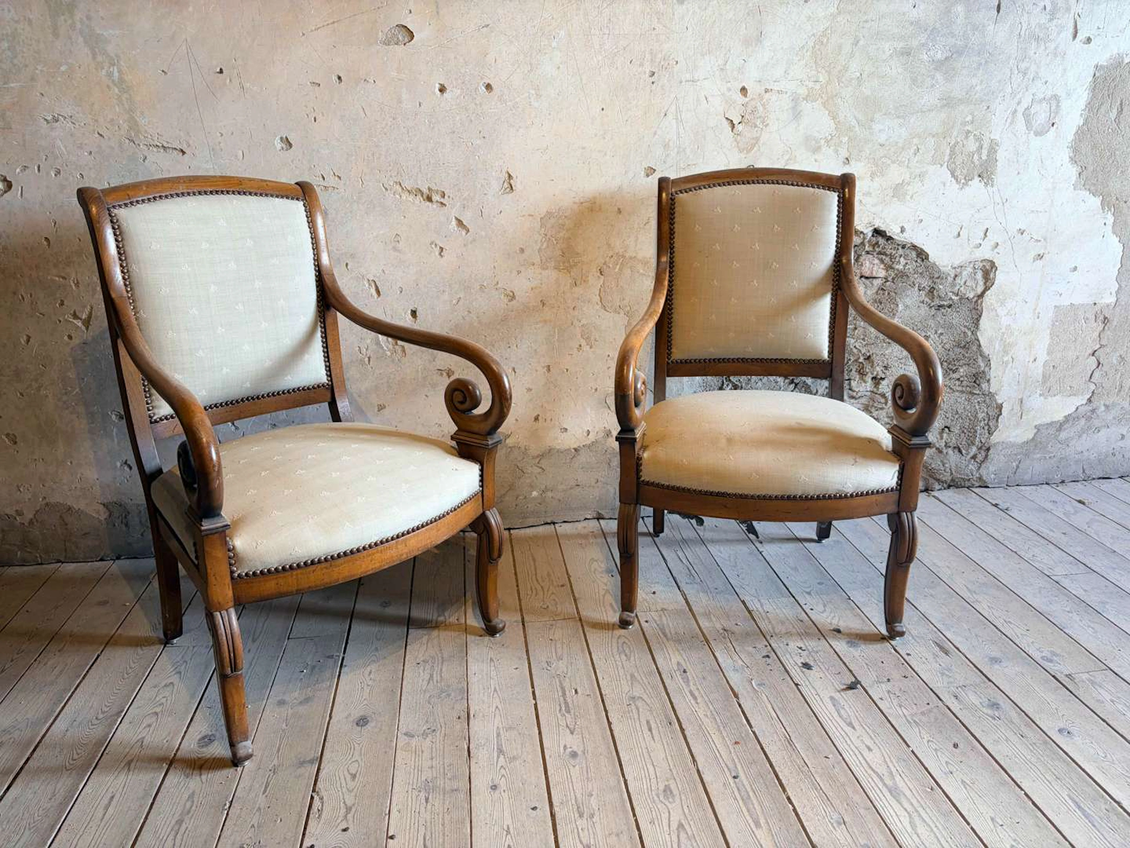 Pair of armchairs, carved from wood