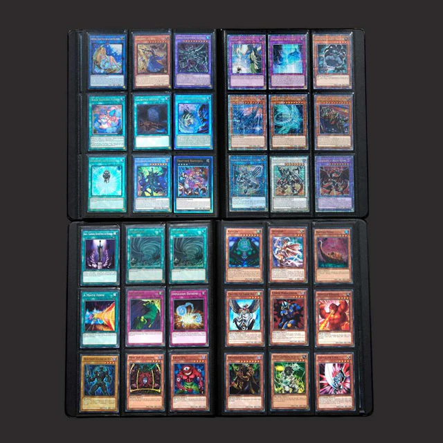 A set of nine Yu-Gi-Oh! portfolios containing collections of cards
