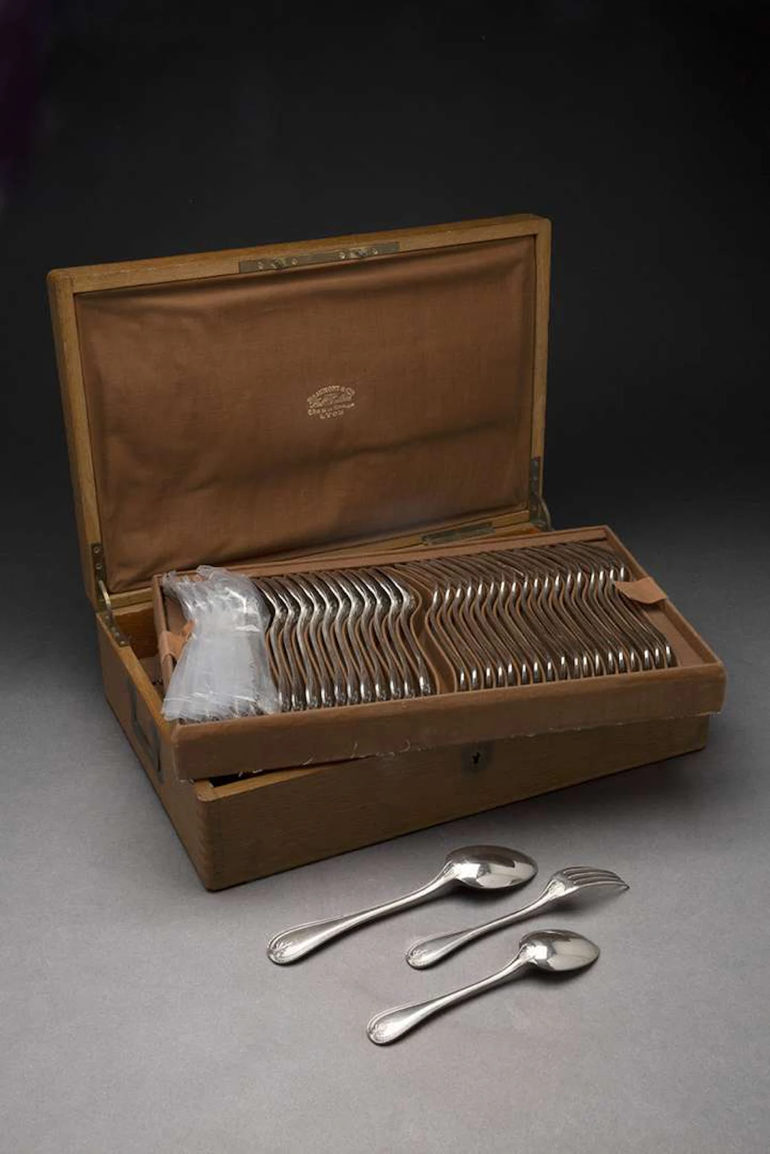 CHRISTOFLE, An 18-place cutlery set in silver-coloured metal, Malmaison design.