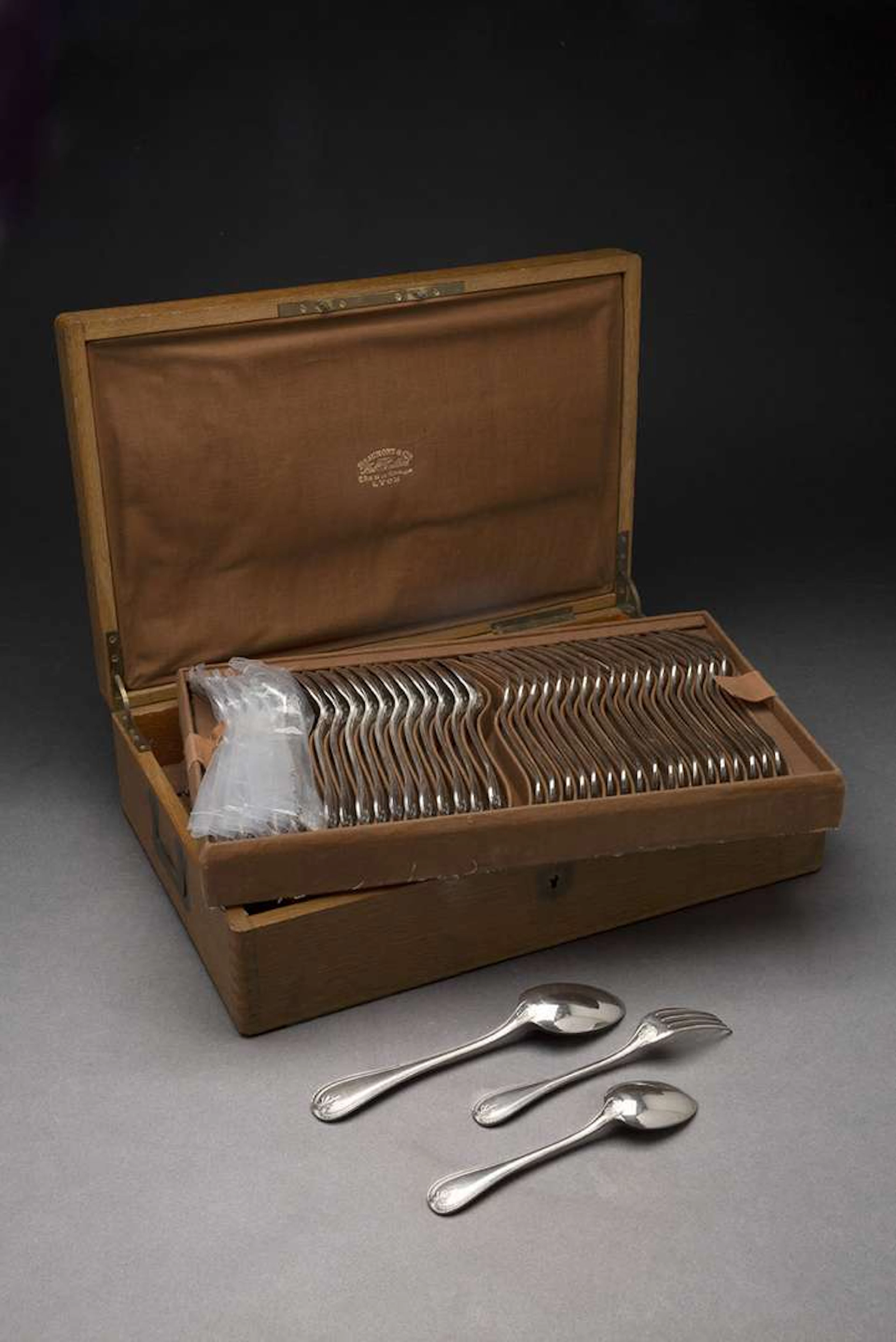 CHRISTOFLE, An 18-place cutlery set in silver-coloured metal, Malmaison design.