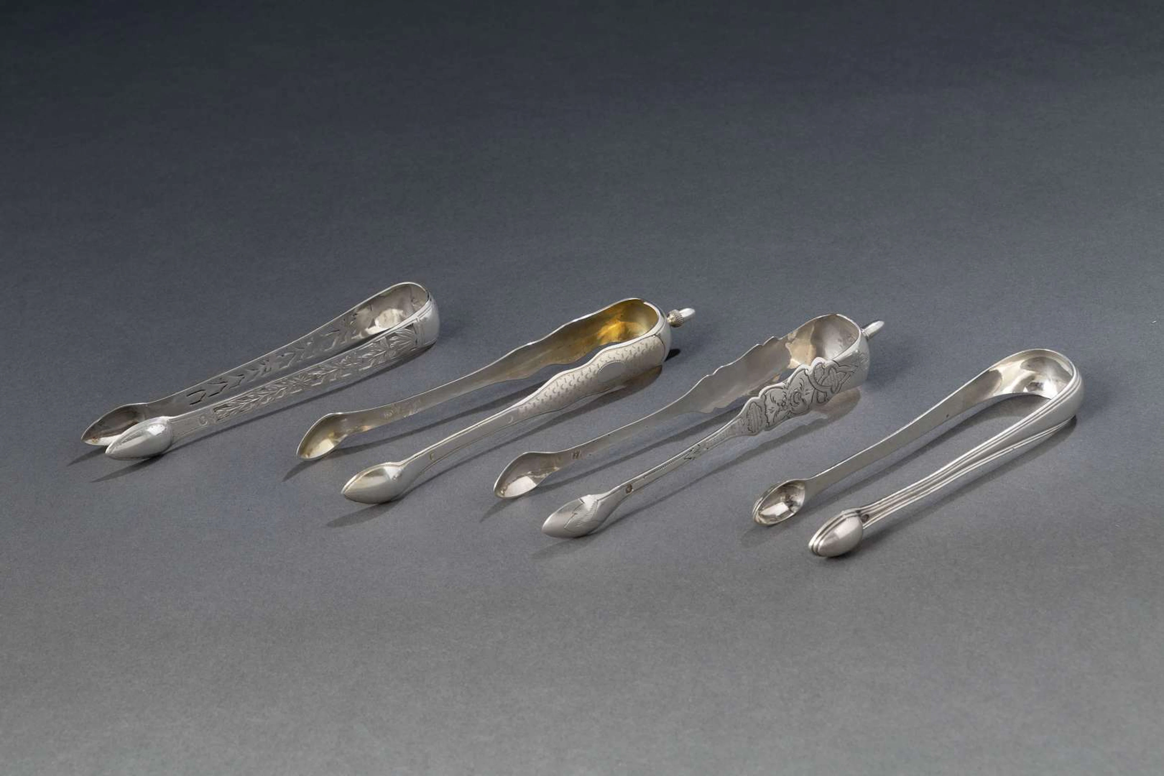 FOUR SUGAR CLAMPS