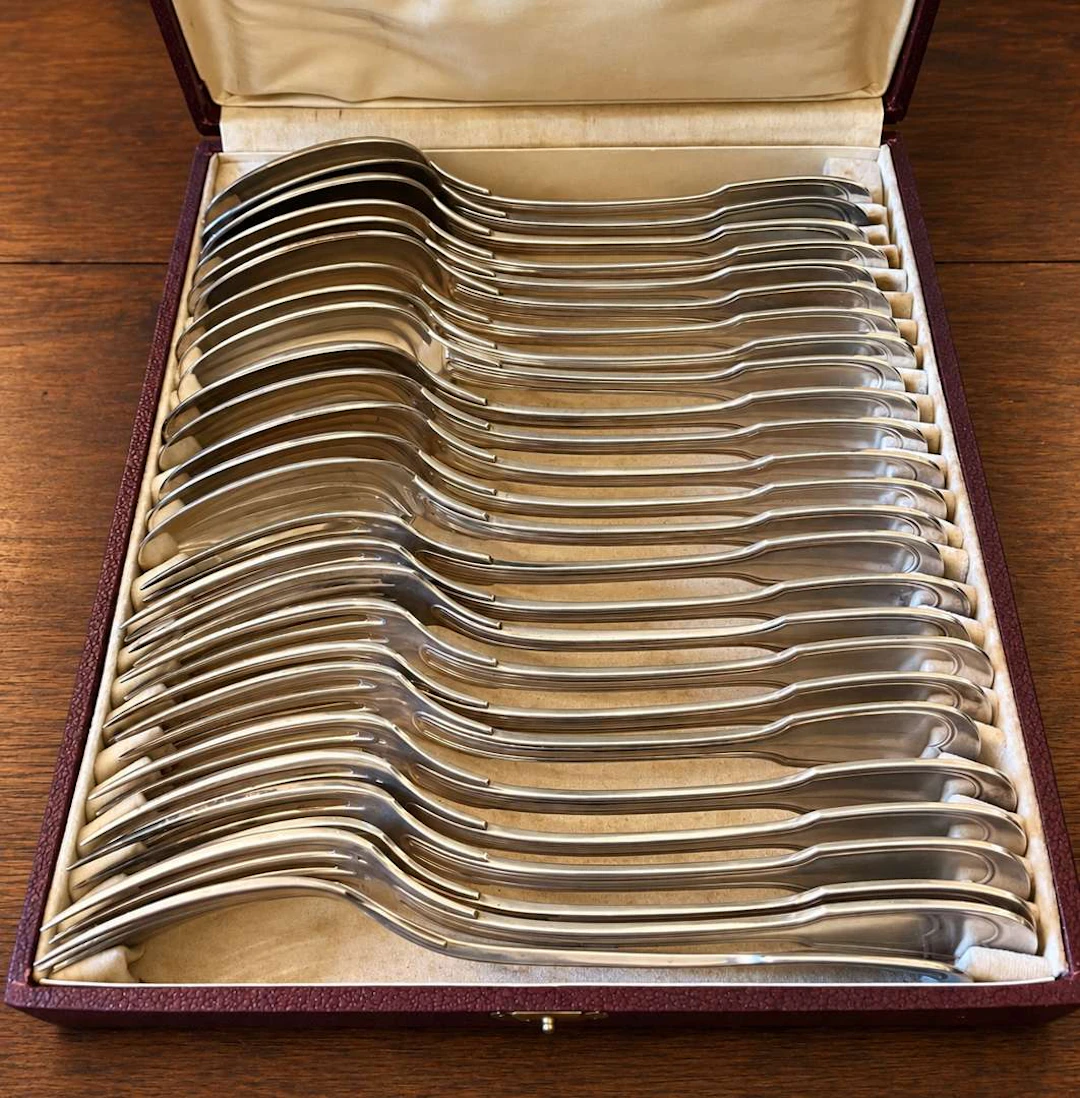 [CUTLERY], Twelve forks and fourteen large spoons made of silver-plated metal