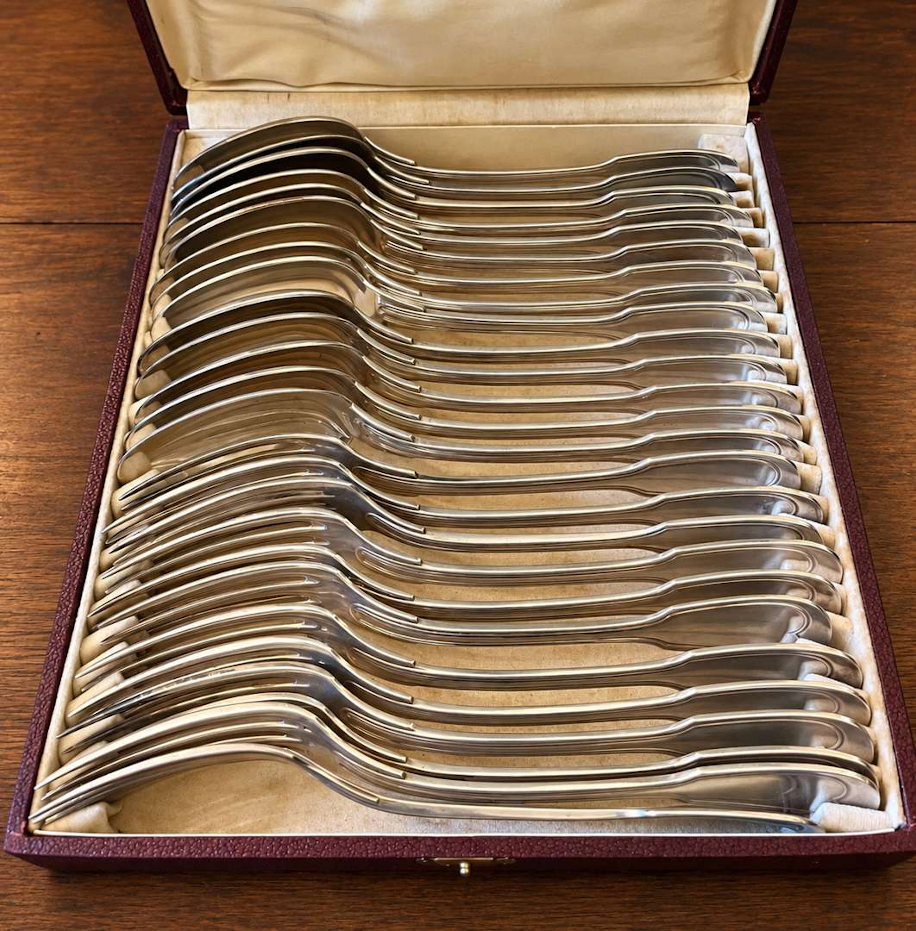 [CUTLERY], Twelve forks and fourteen large spoons made of silver-plated metal