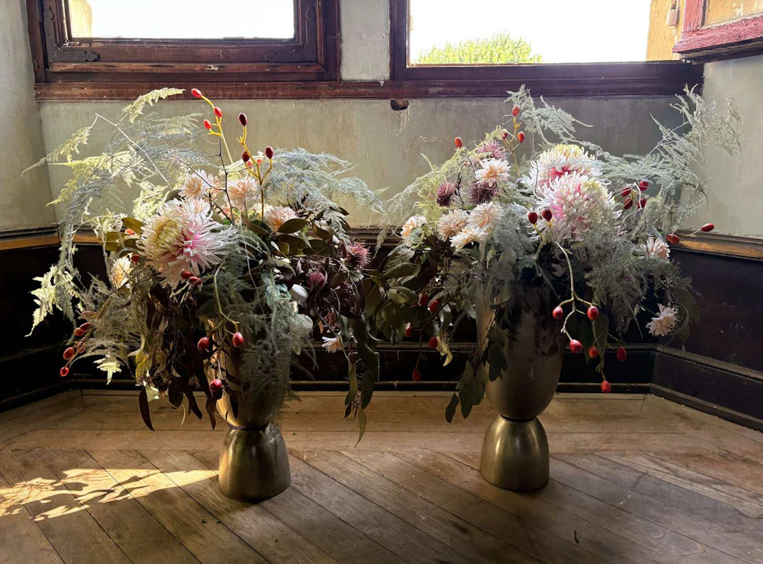 [FLORAL ARRANGEMENTS], A set comprising two contemporary vases, artificial
