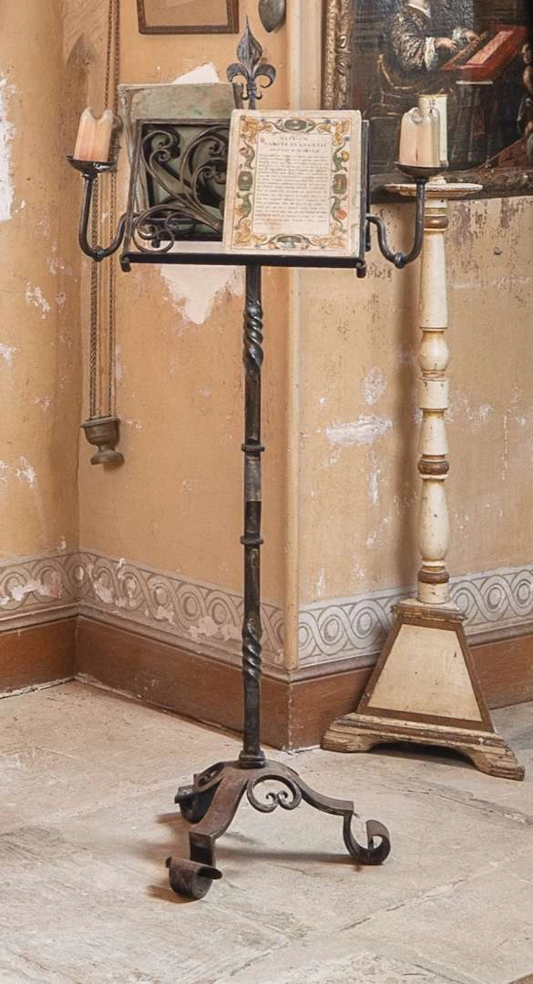 The pulpit, made of wrought iron, with two light arms
