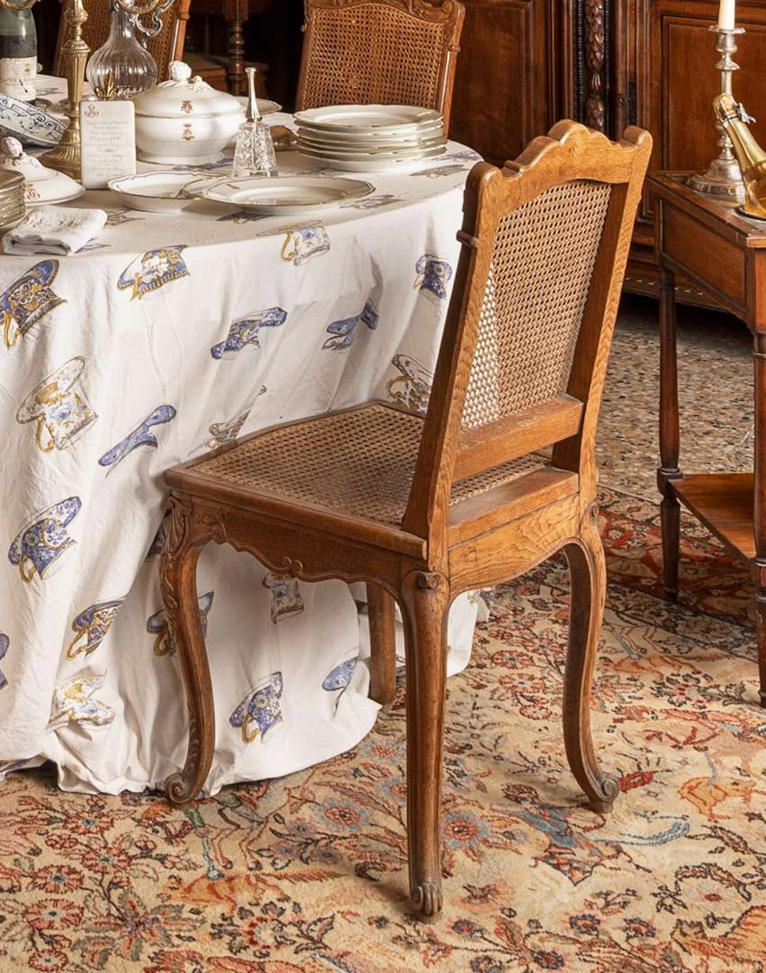 [CHAIRS], Set of ten carved wooden cane chairs
