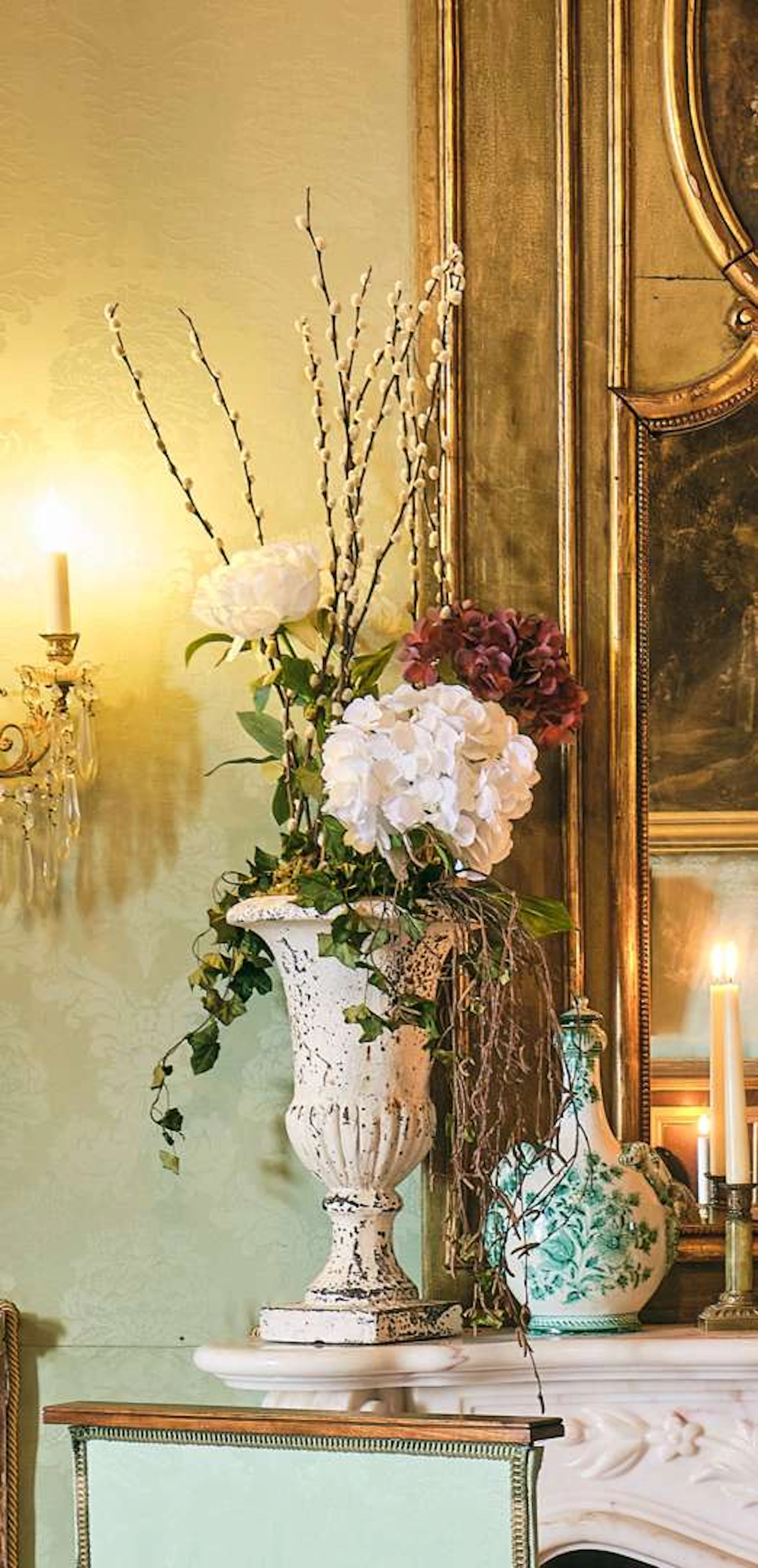 A pair of Medici vases, with a white patina