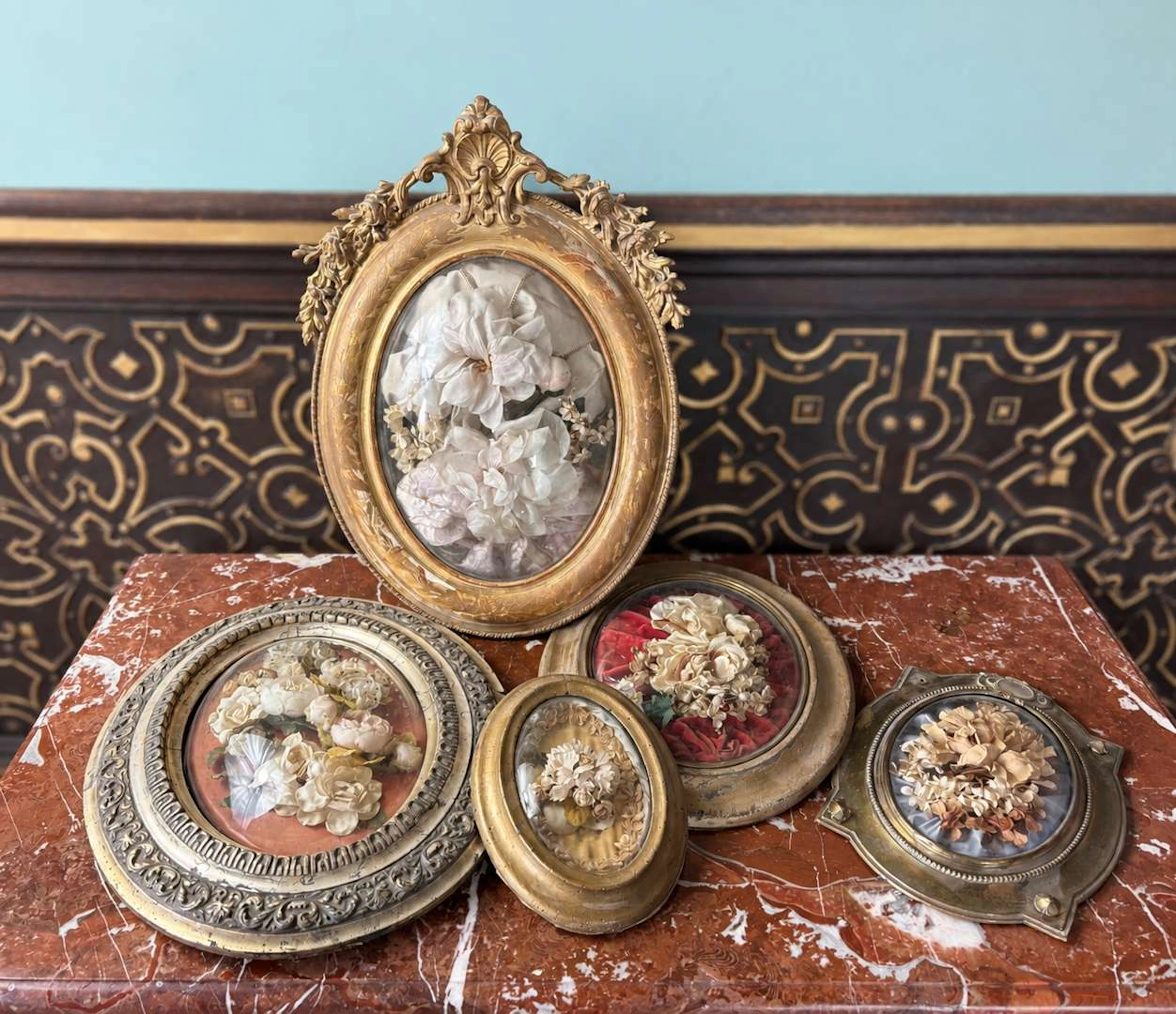 [FLOWERS UNDER GLASS], A set of five floral arrangements under domed glass
