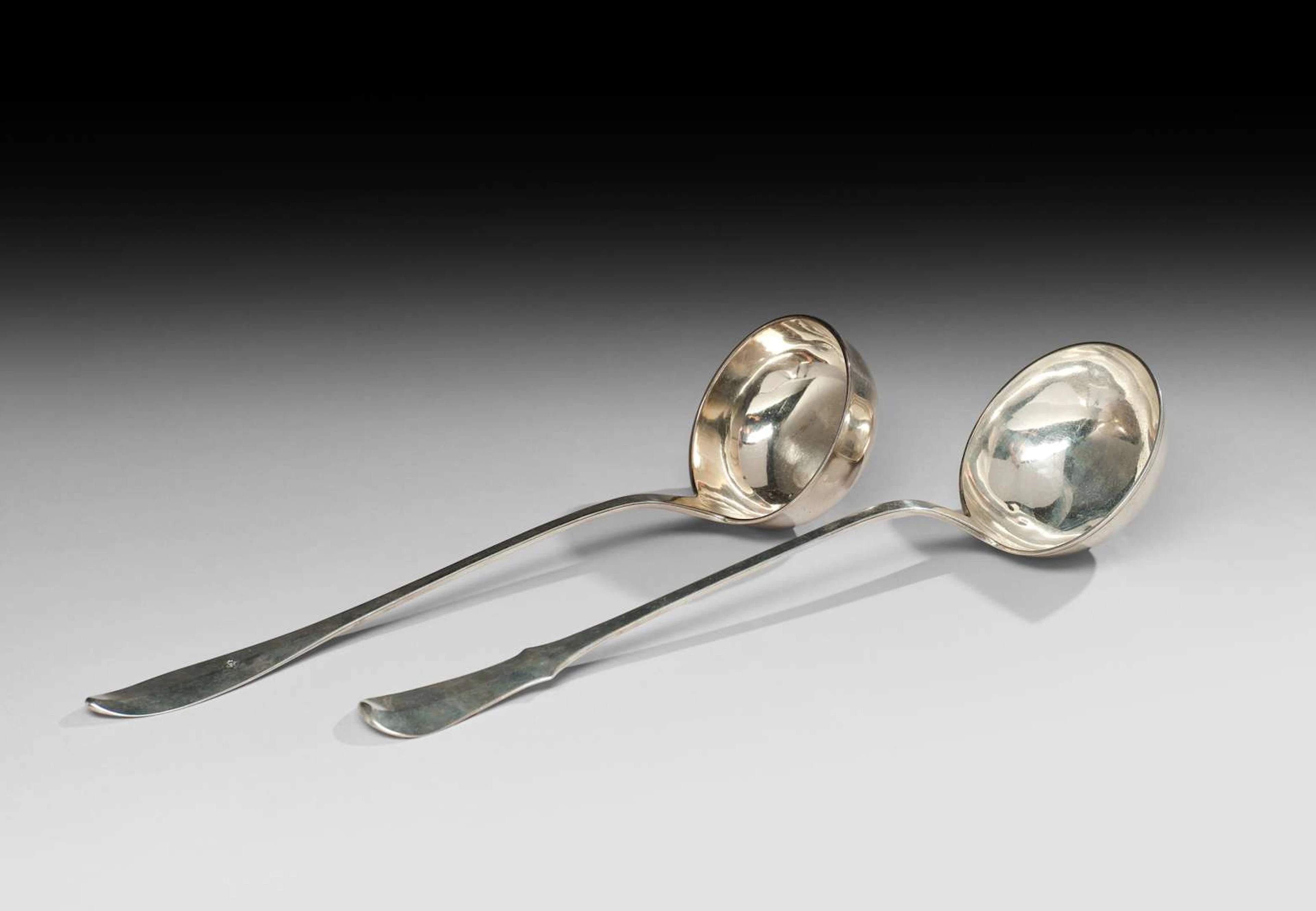TWO SILVER LADLES