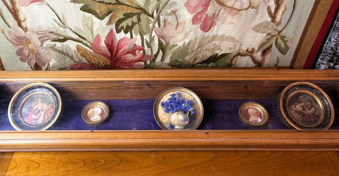 [THUMBNAILS], Five miniatures in a wooden display case