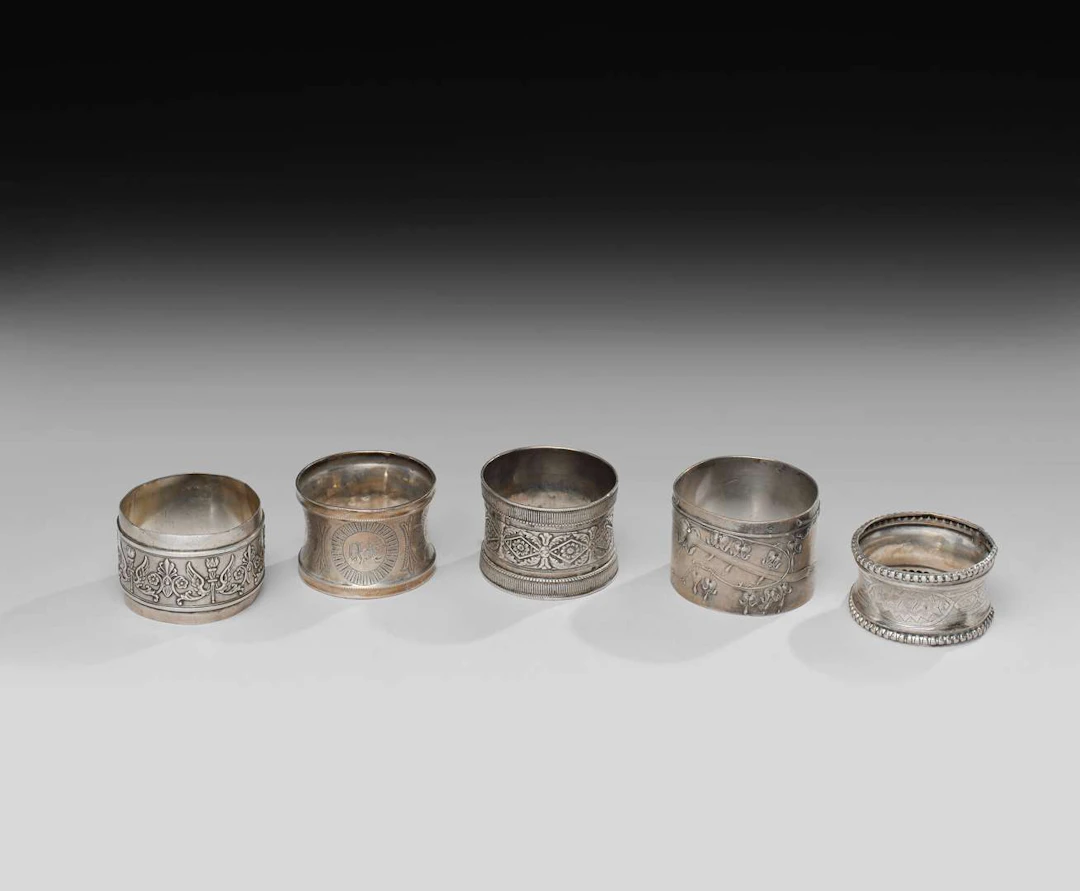 FIVE NAPKIN RINGS