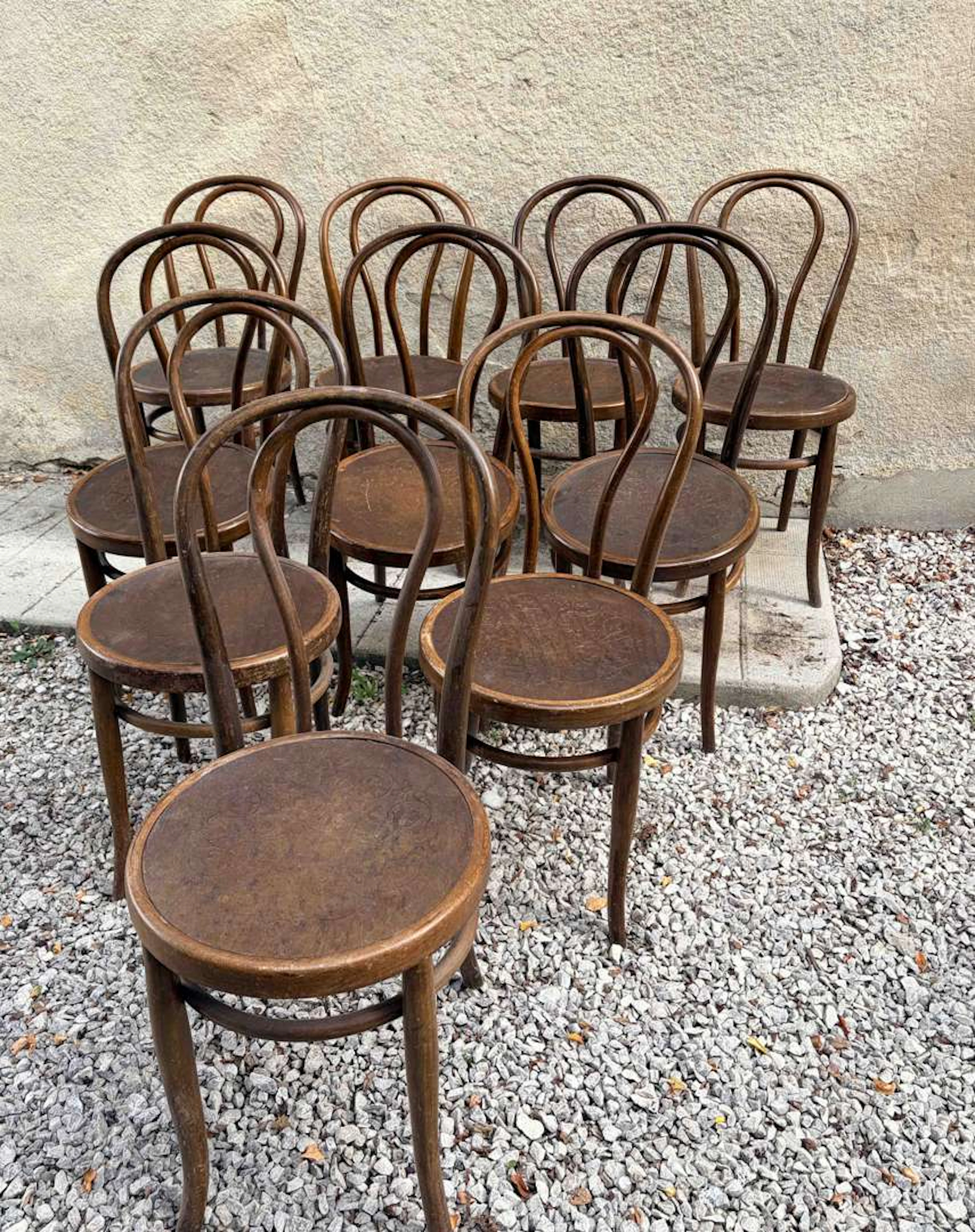 In the THONET style, Ten wooden bistro chairs