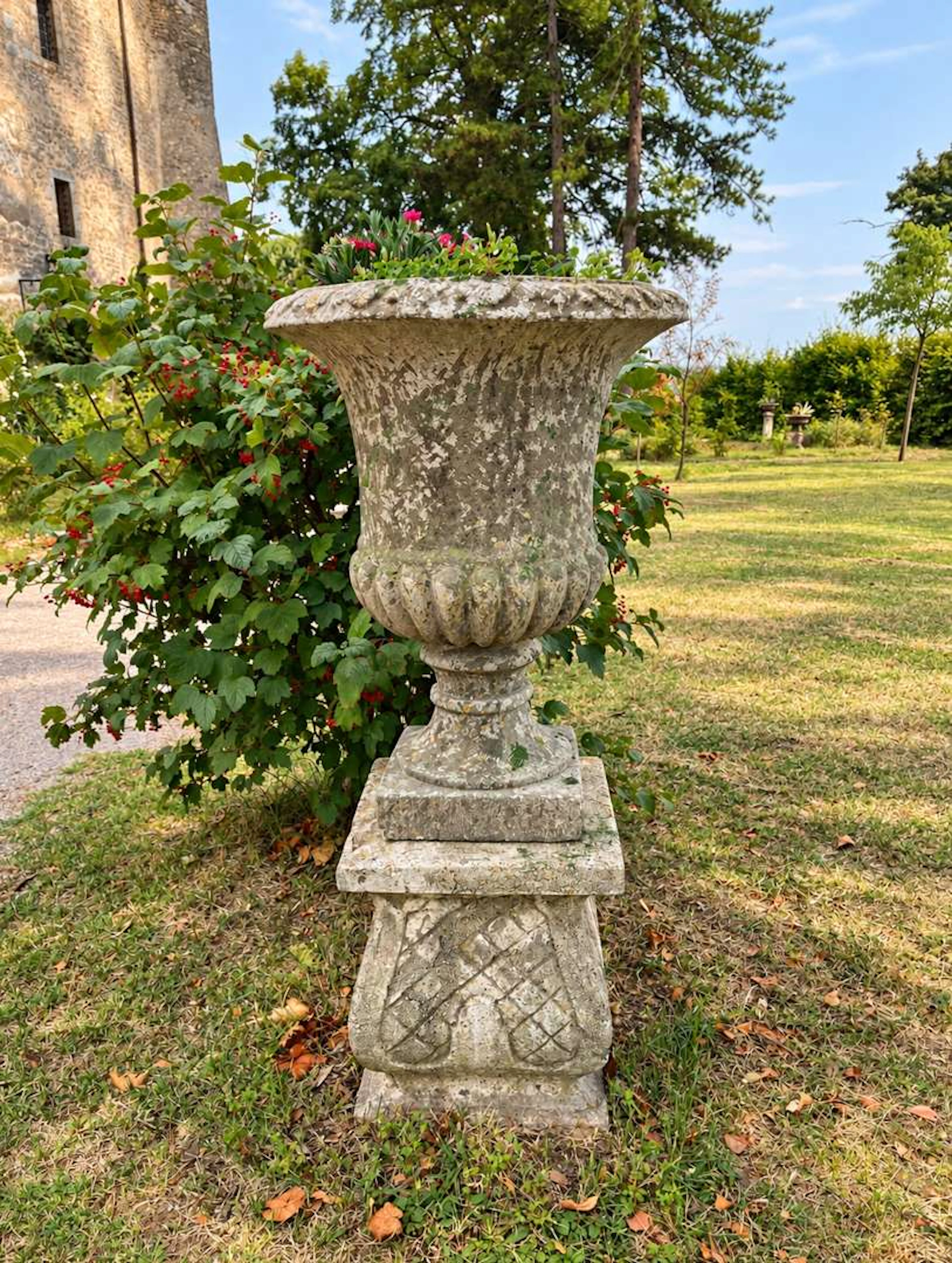 A pair of Medici vases, in imitation reconstituted stone