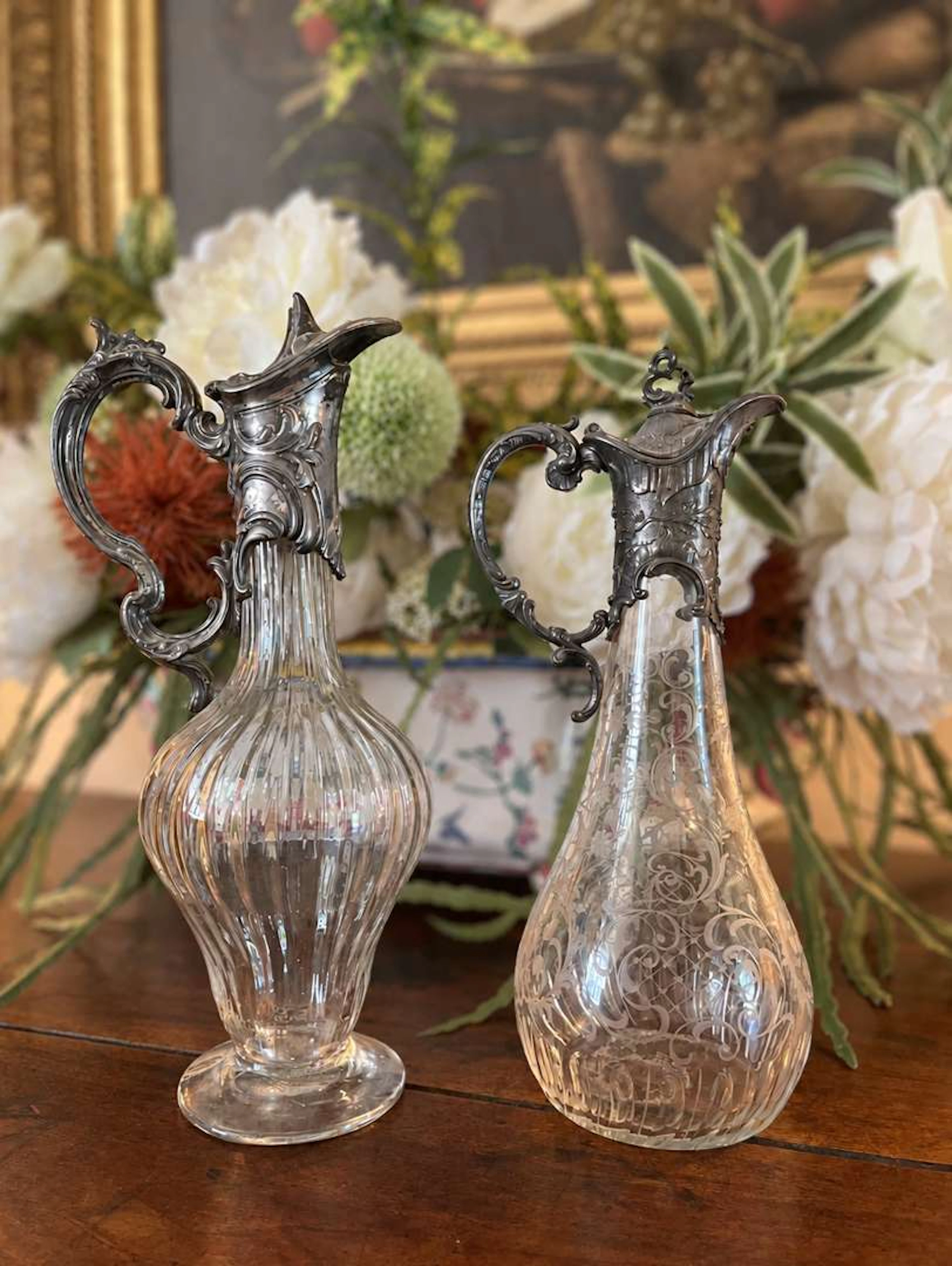 Set of two carafes, made of cut and engraved glass