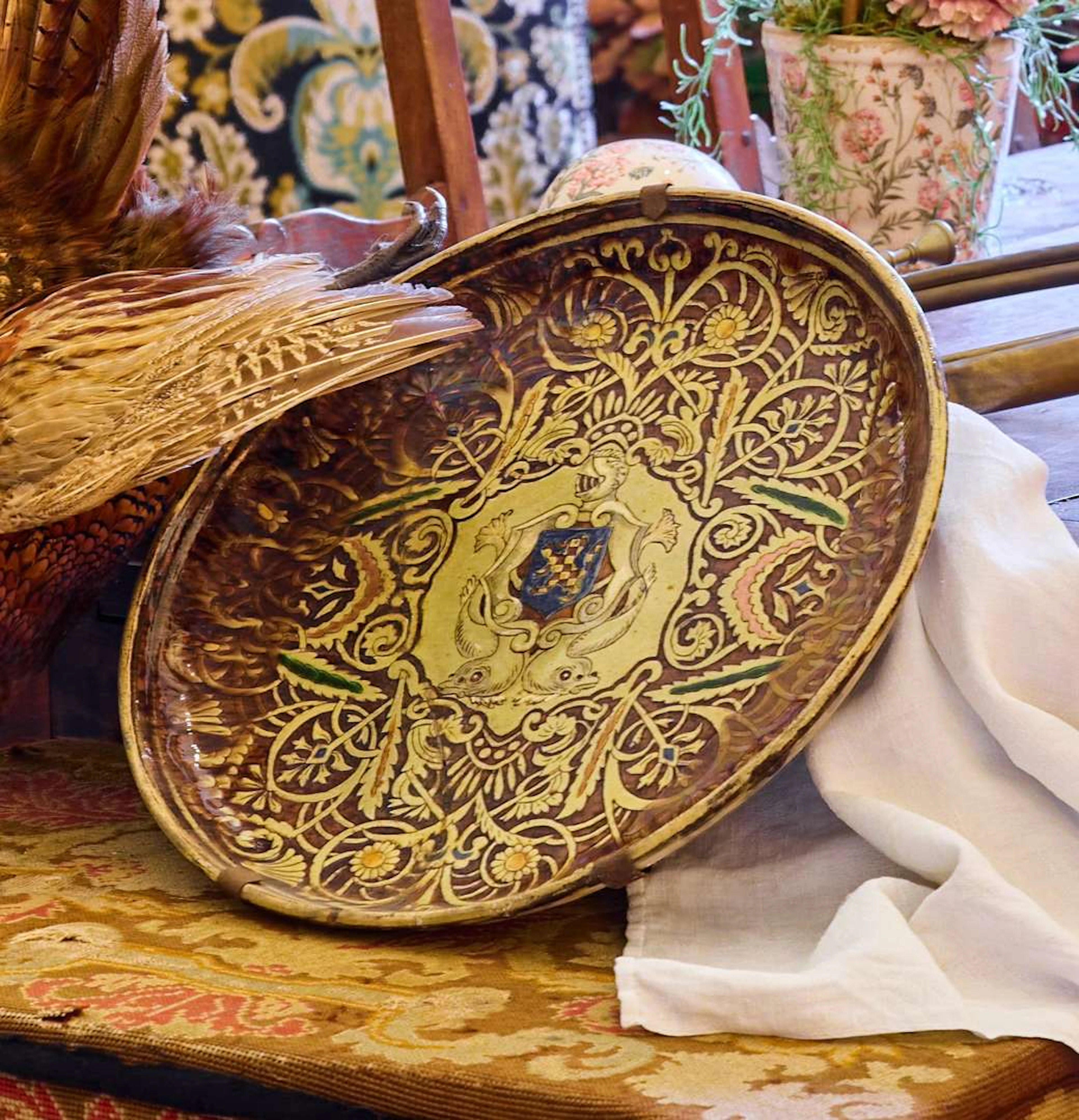 Three large round plates, glazed terracotta