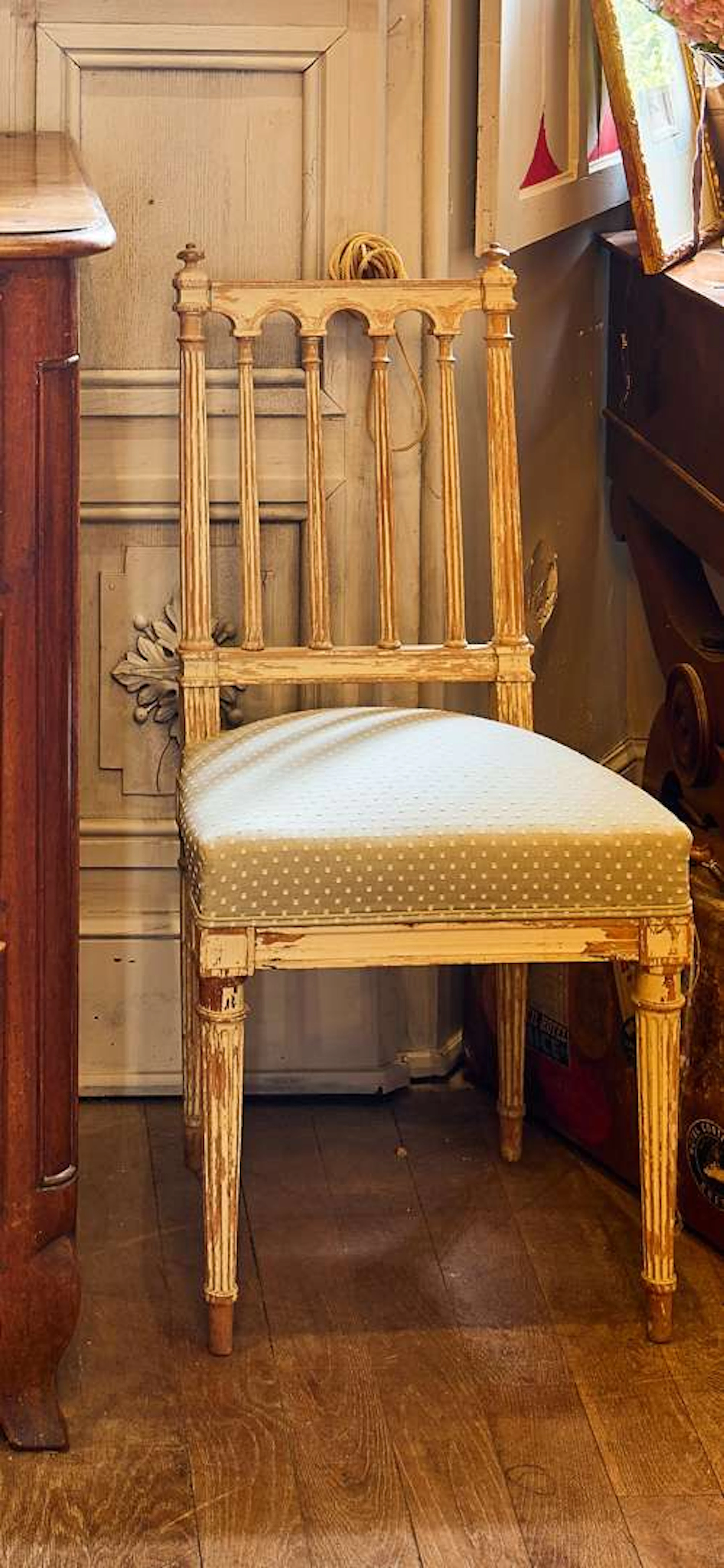 Set of four chairs, carved and painted wood
