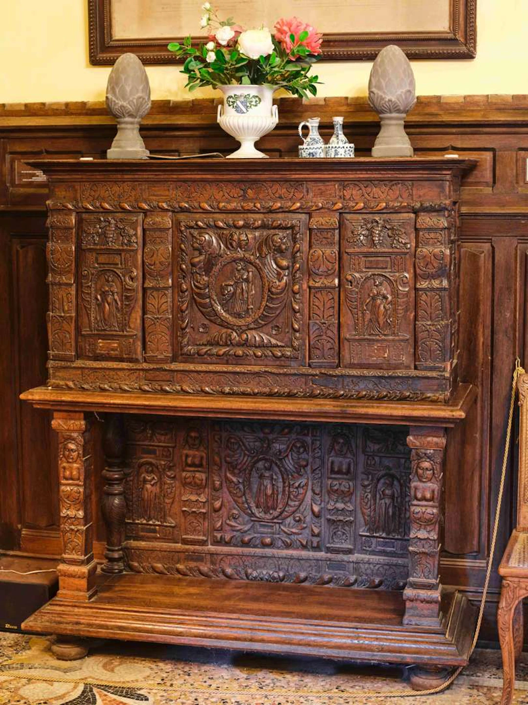 A two-part backsplash with decorative panels, made of wood