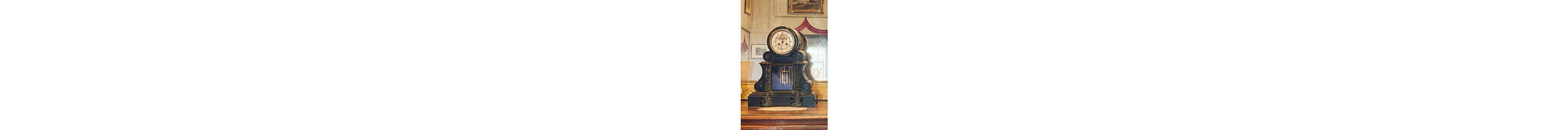 Clock, in black and sea-green marble