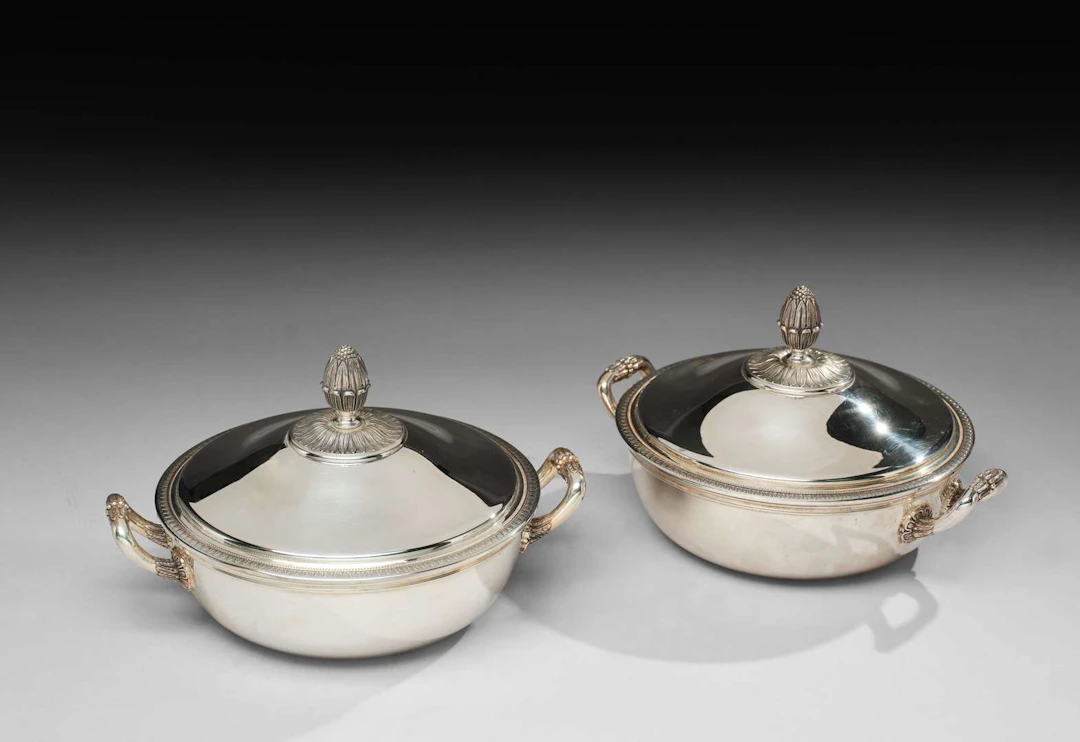 CHRISTOFLE, A pair of silver-coloured metal vegetable bowls, Malmaison style.