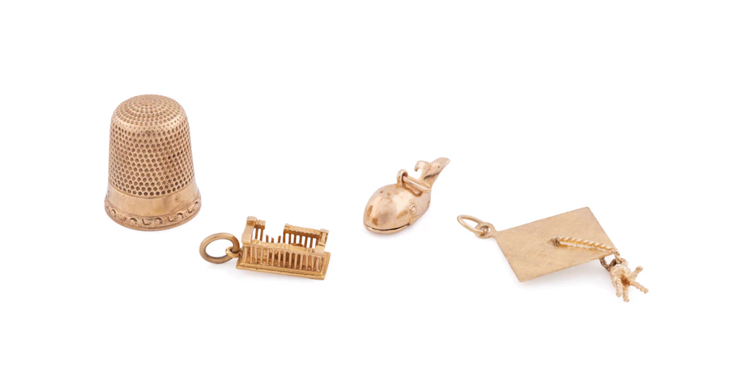 Three Yellow Gold Charms and Thimble