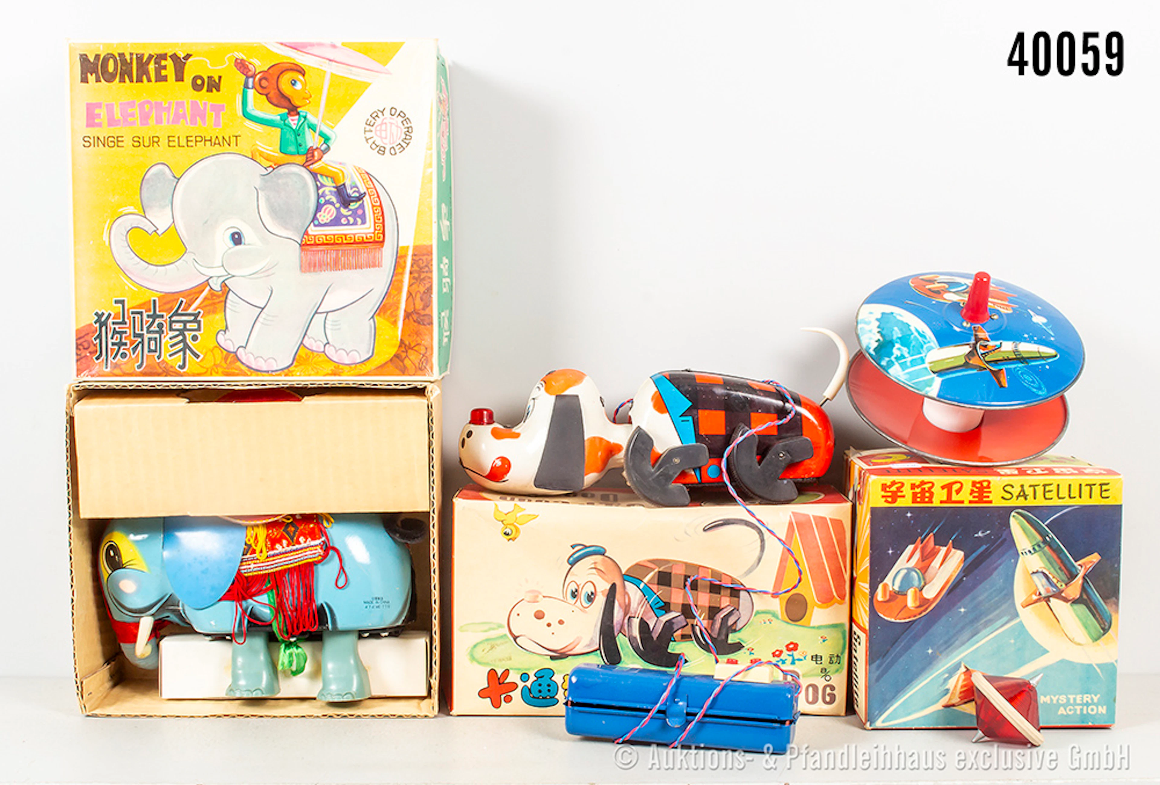 Blechspielzeug, ME 776 "Monkey on Elephant", ME 761 "Satellite" und